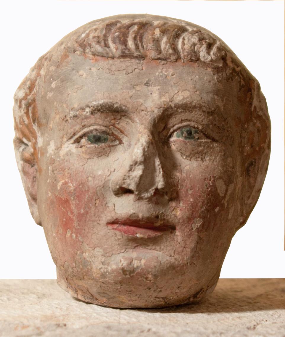 XIV th century head of a monk with polychromy - Sculpture by Unknown