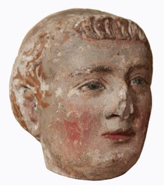 XIV th century head of a monk with polychromy