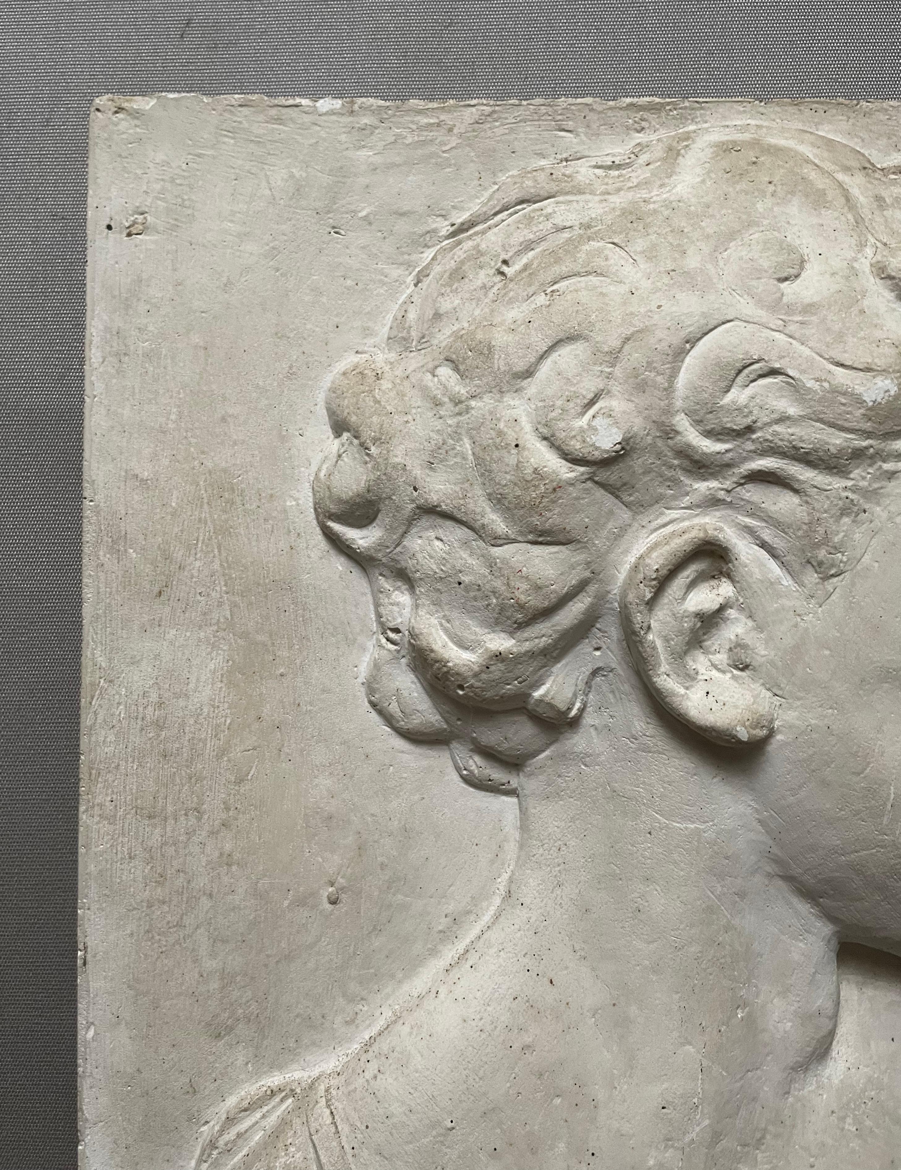 Young Man In Profile, Bas Relief In Plaster, Early 20th Century - Brown Figurative Sculpture by Unknown