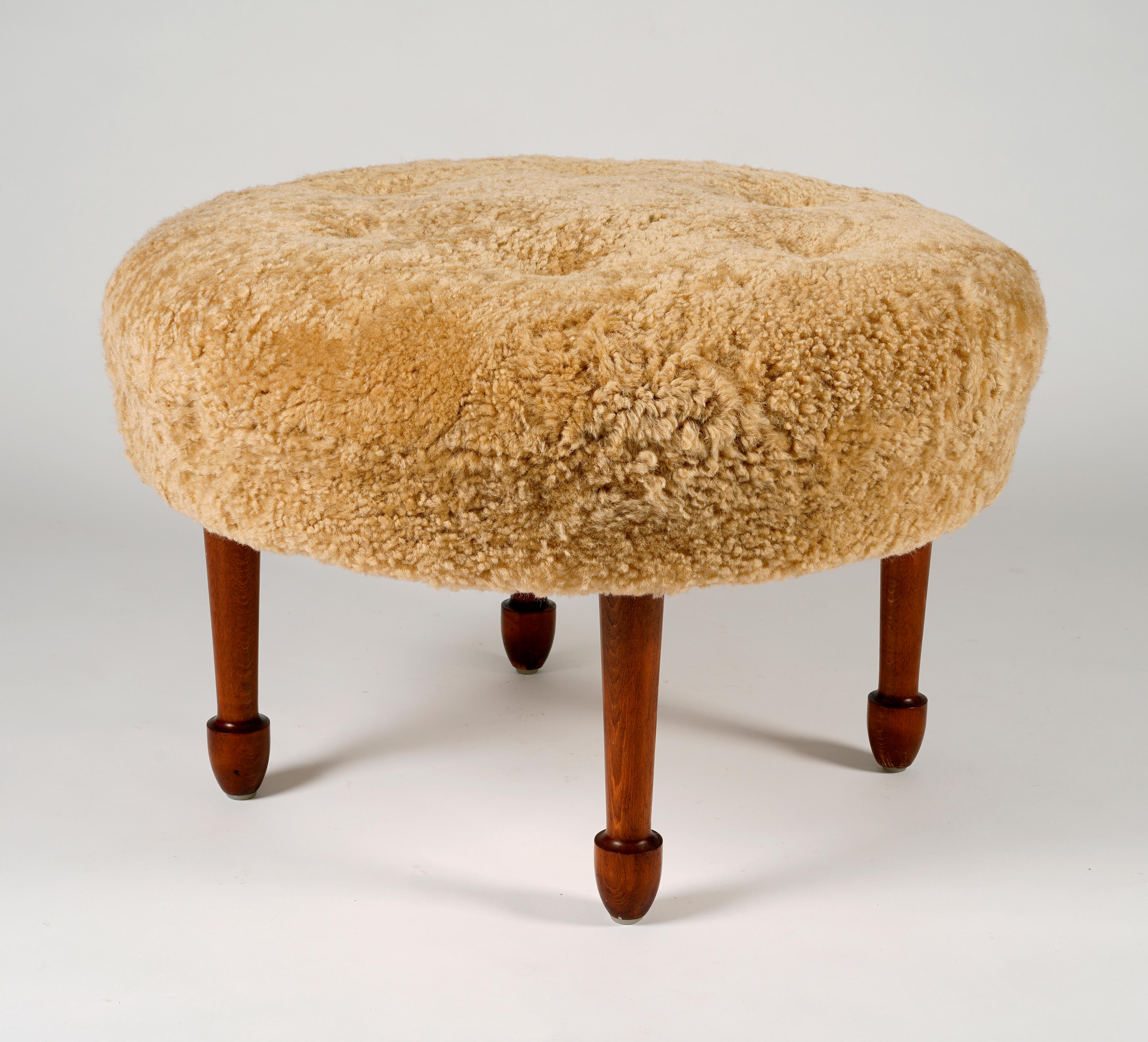Scandinavian Modern Unknown swedish designer, oversized stool reupholstered in sheepskin, 1960s For Sale