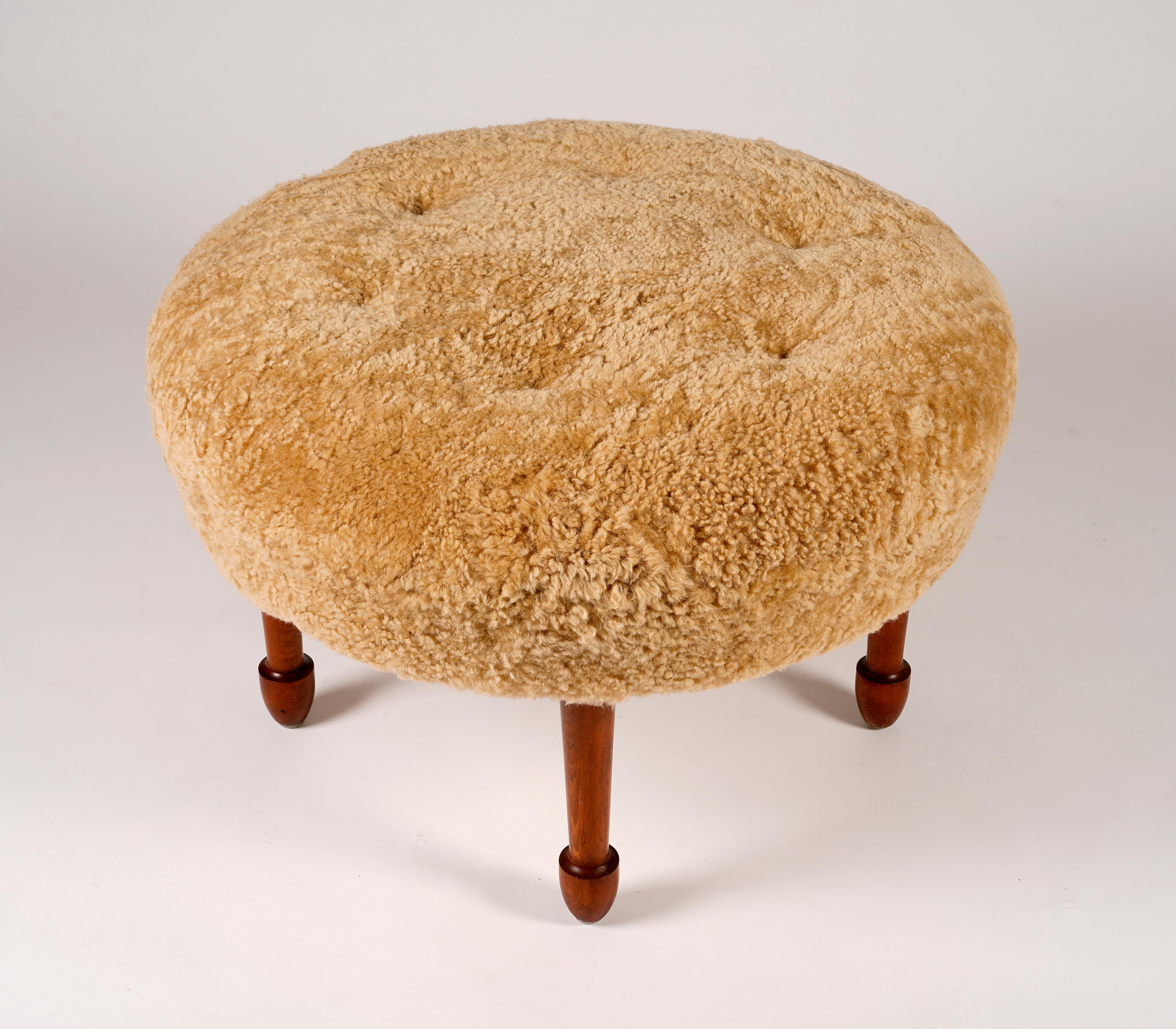 Swedish Unknown swedish designer, oversized stool reupholstered in sheepskin, 1960s For Sale