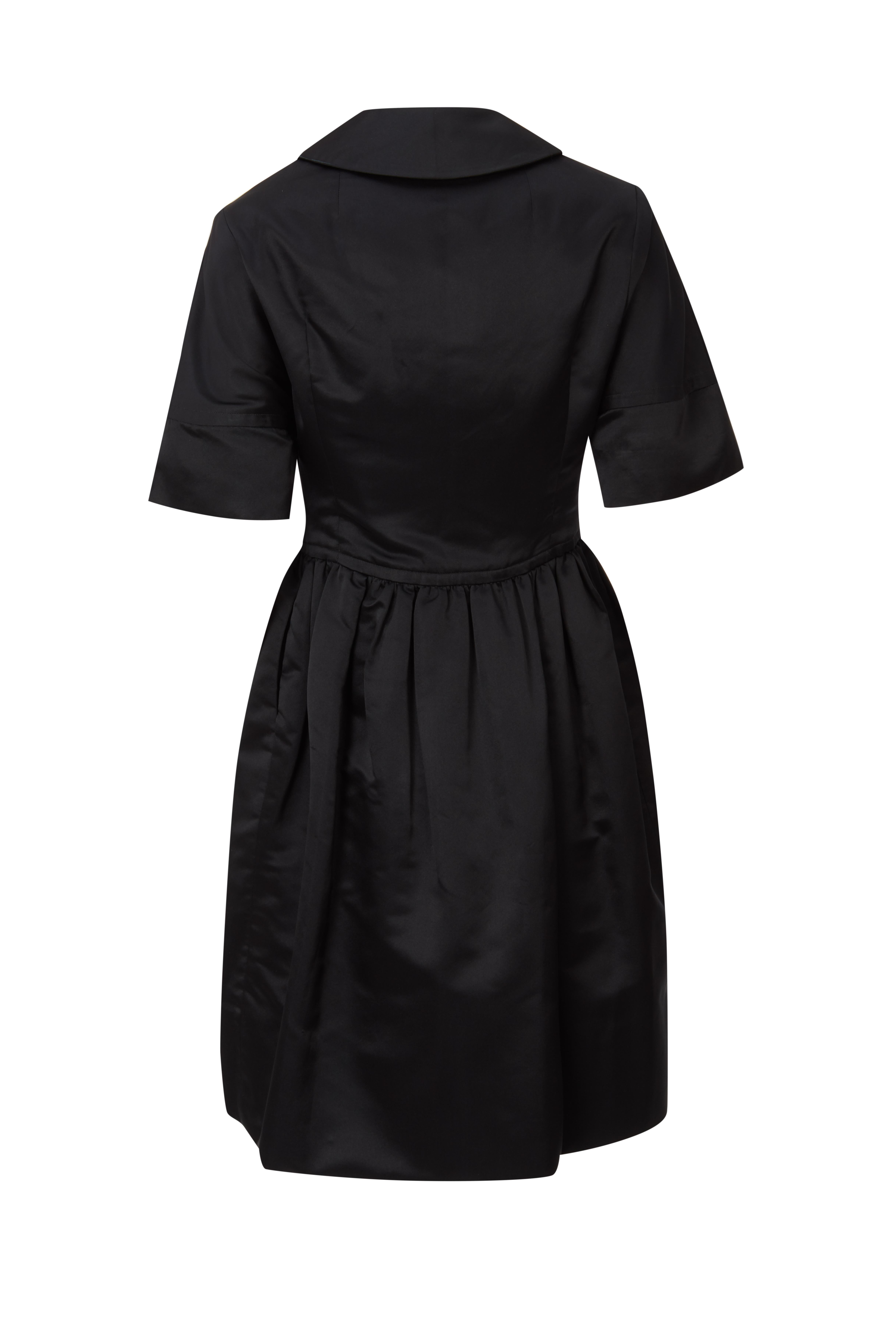 Elegant black unlabelled Christian Dior midi dress. Midi box pleated skirt makes it simple and sophisticated. The dress is strapless with a heart shape top and constructed in silk. 
