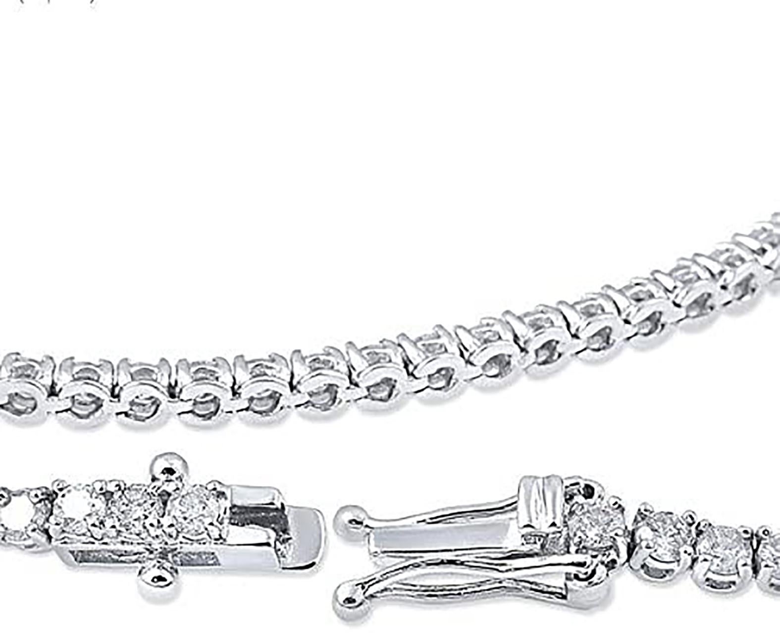 Indulge in the ultimate expression of luxury and sophistication with this stunning diamond tennis bracelet. Crafted from premium 14K white gold, this bracelet features a total of 3 carats of G+ color SI+ clarity diamonds that exude unmatched