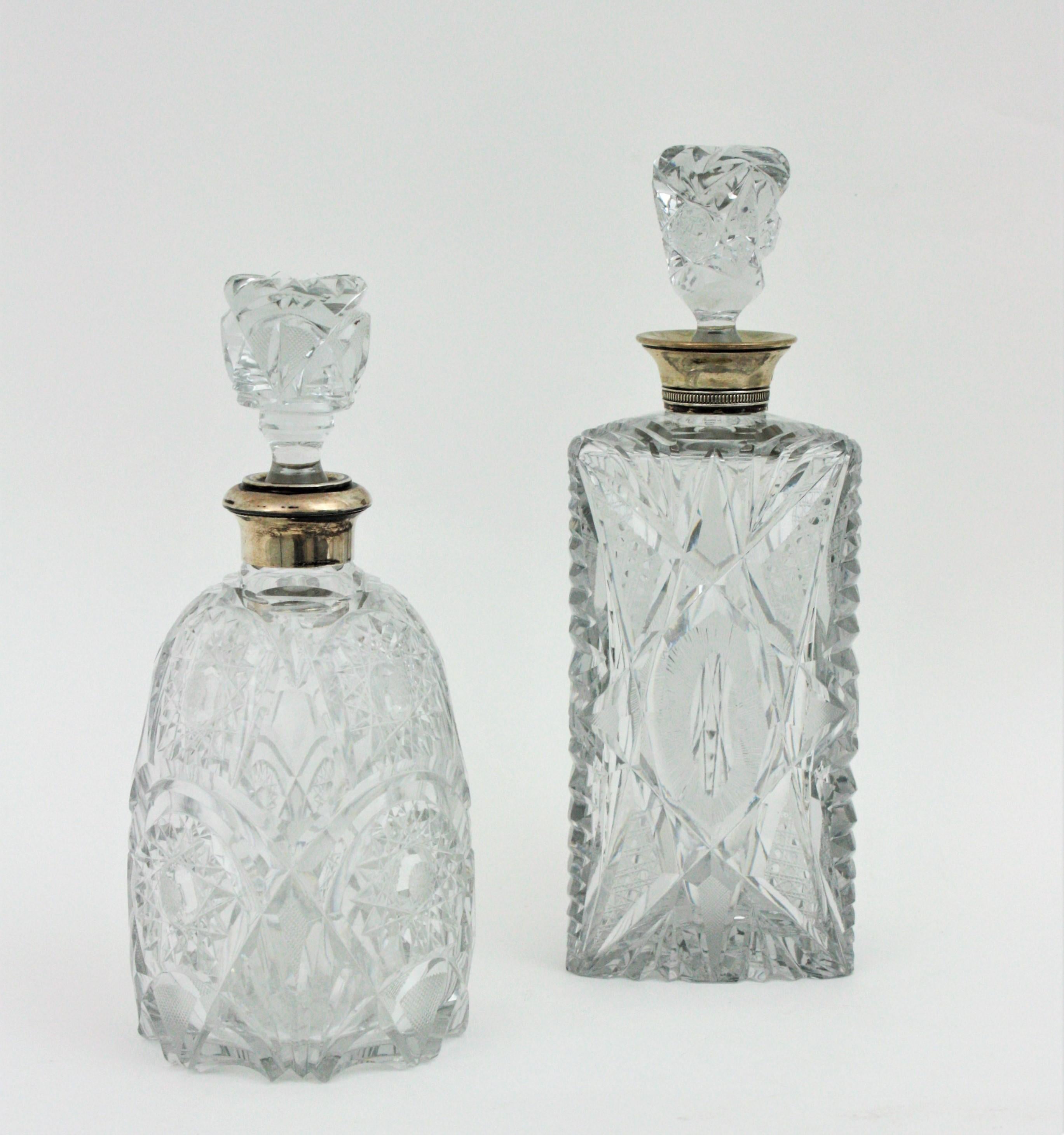 Faceted Unmatching Pair of Cut Crystal and Silver Liqueur Decanters