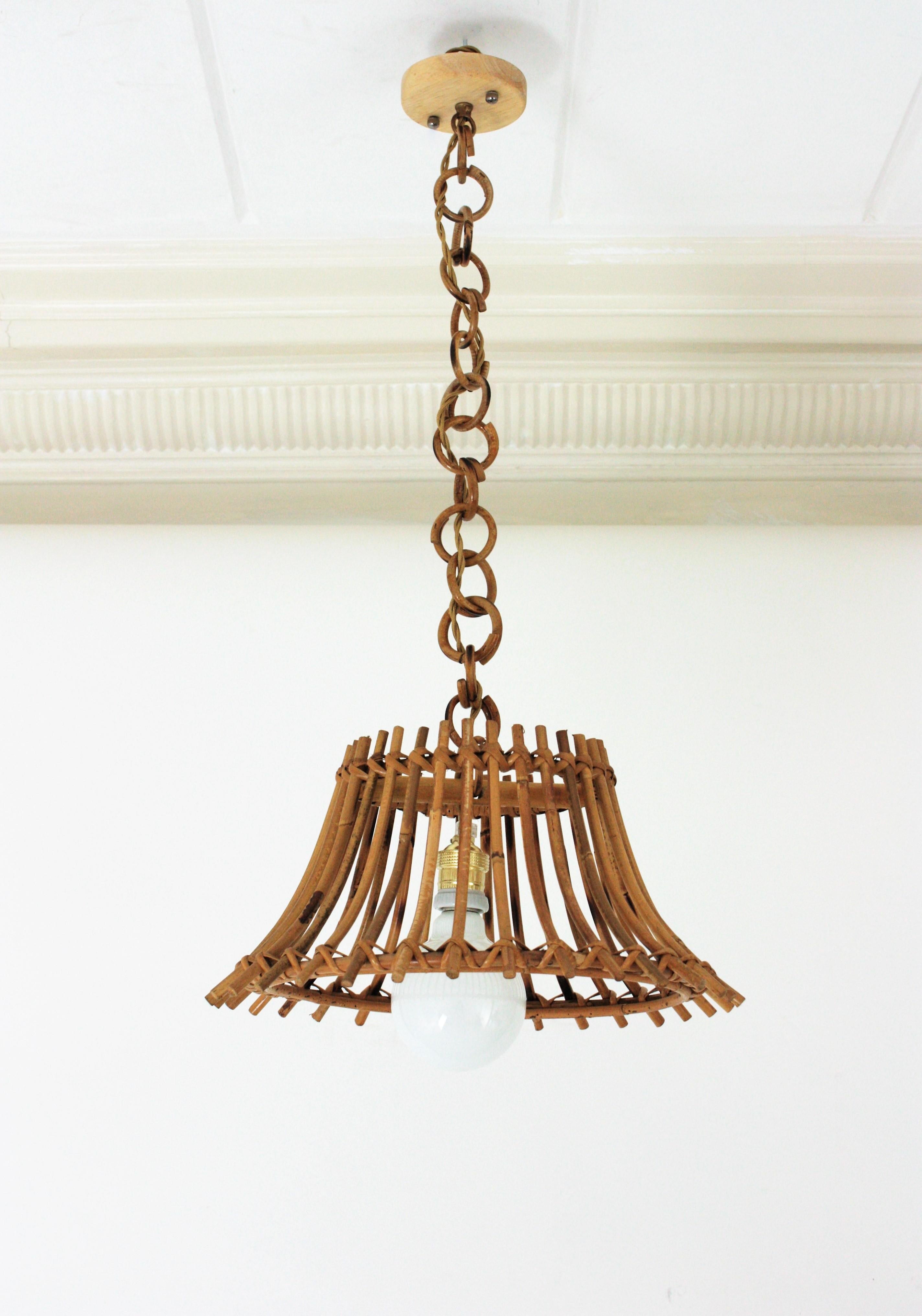 Italian Unmatching Pair of Rattan Bamboo Pendants / Hanging Lights For Sale