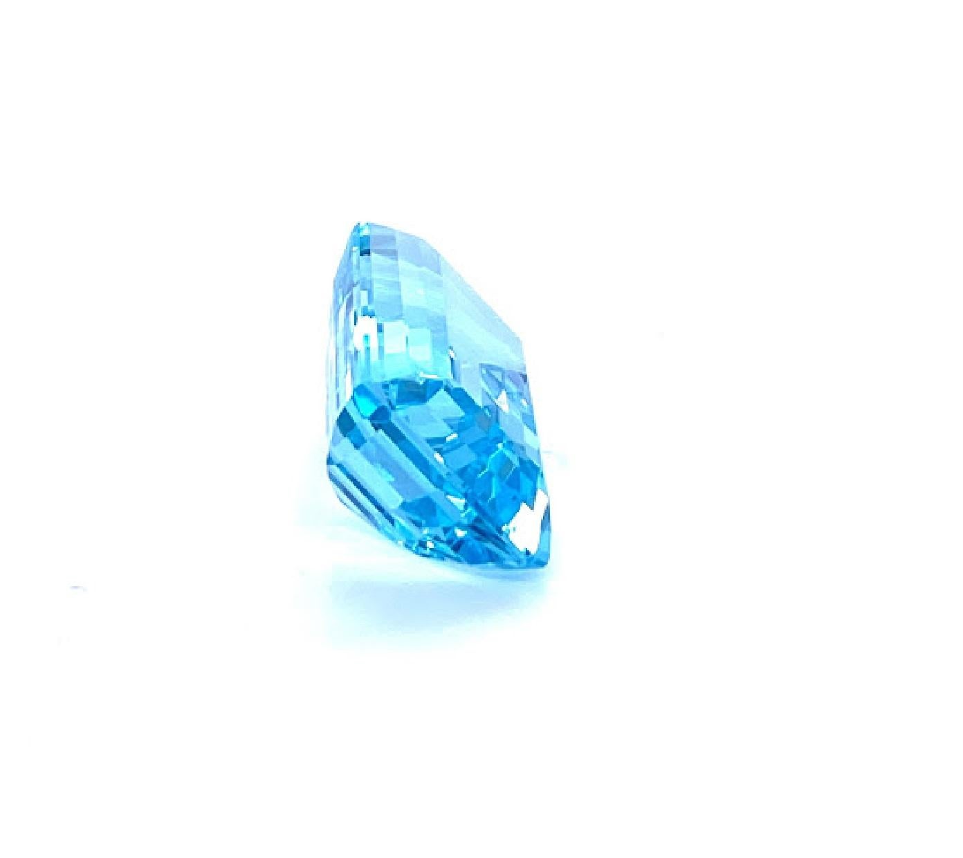 Emerald cut aquamarine measuring 17.36 x 11.15 x 8.13 mm.  12.24 carat total.