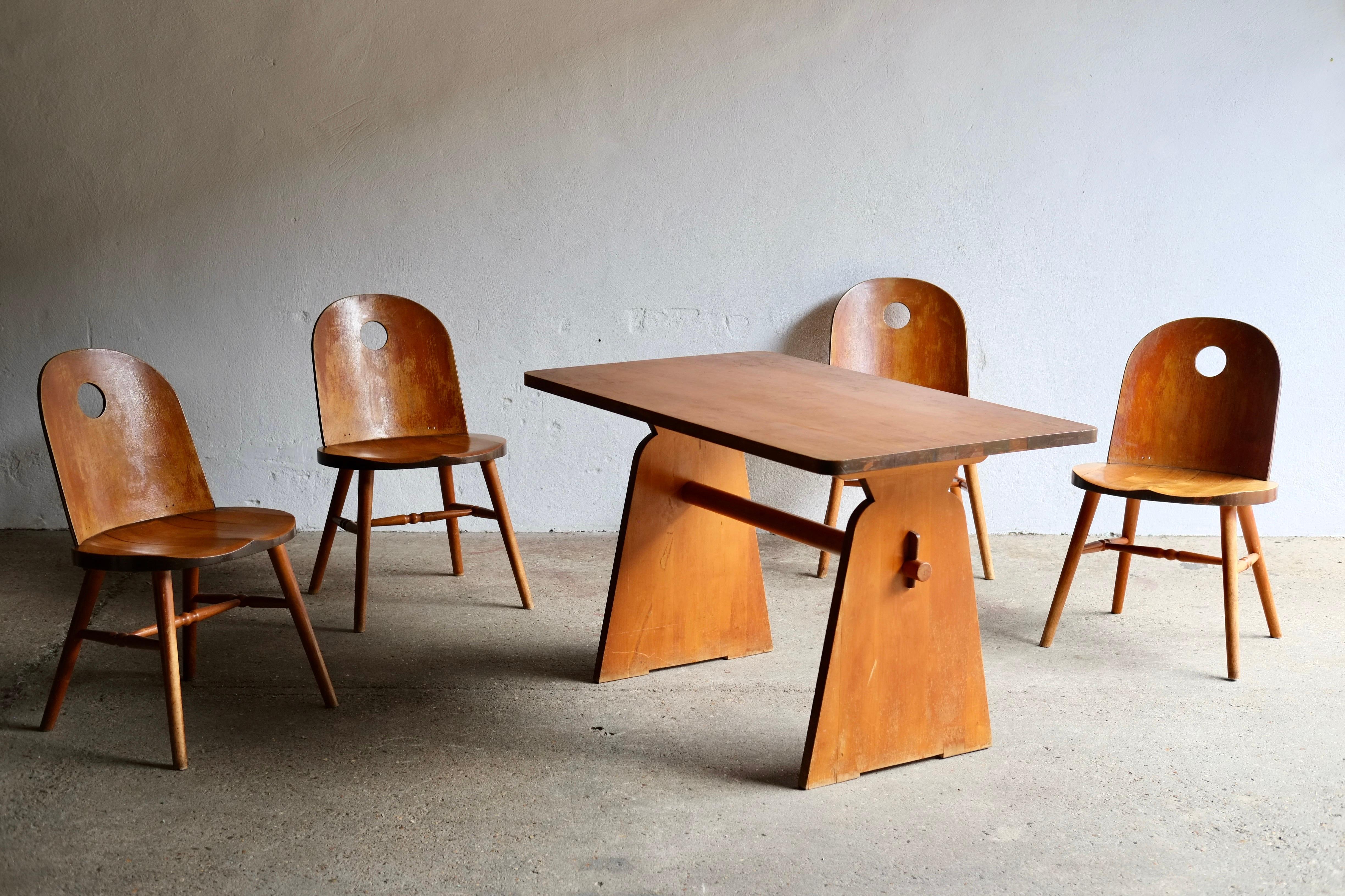 A birch dining table and chairs by Swedish architect and city planner Uno Åhren (1897-1977) for Gemla. 

Masterly crafted in birch wood with birch ply seat backs and pegged joints. 

Featuring a warm golden patina that only nearly 100 years of age