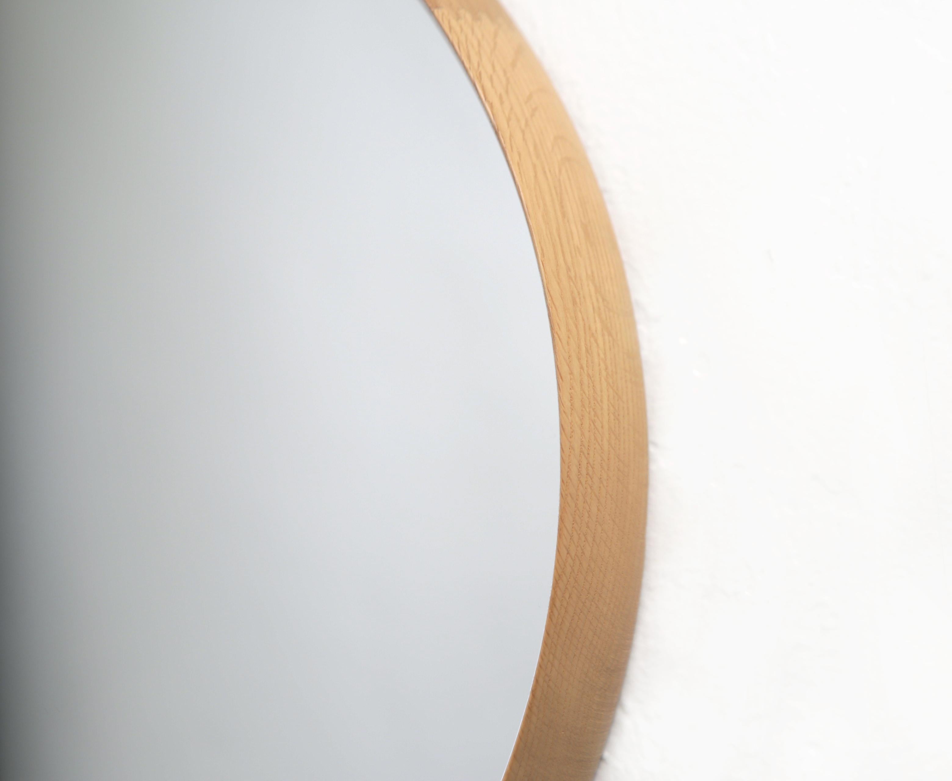 Uno and Osten Kristiansson round oak mirror by Luxus, Sweden, 1960s

This vintage oak mirror is designed by renowned midcentury Swedish designers Uno and Osten Kristiansson for Luxus in the 1960s. It is truly an exquisite and sought after piece.