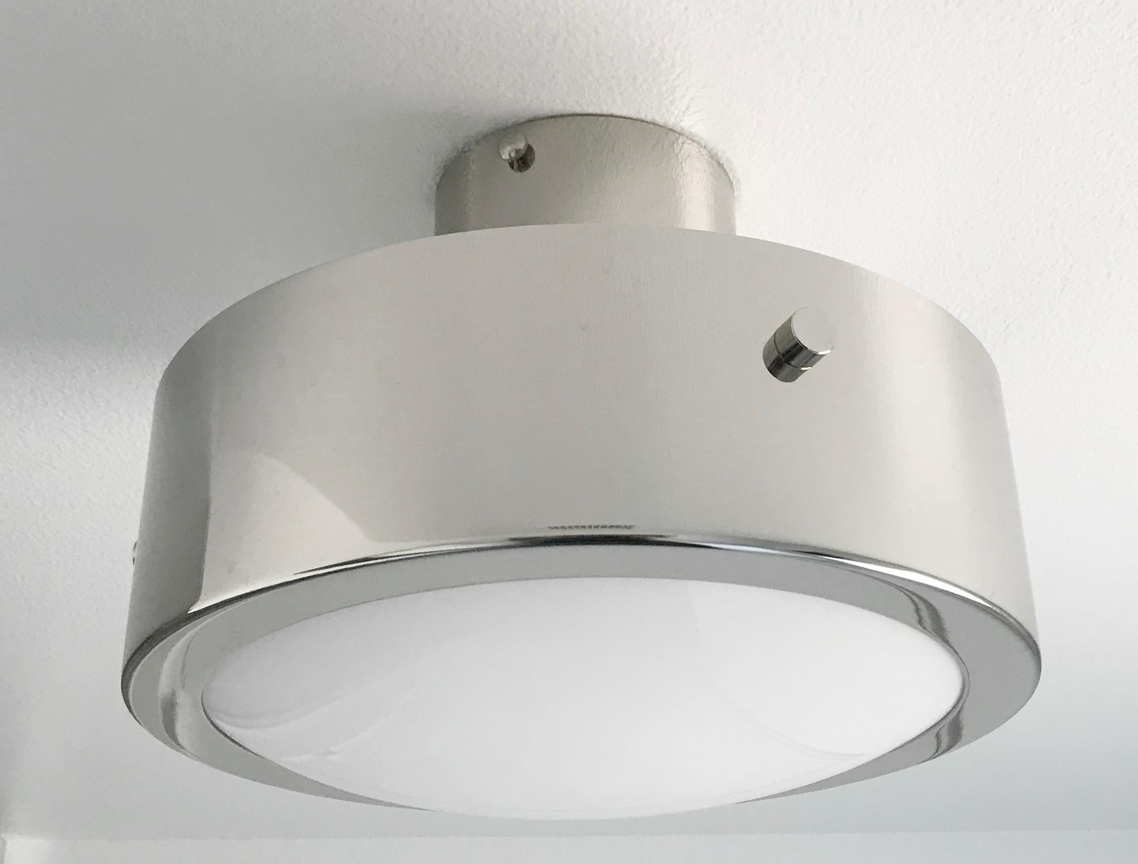 Italian flush mount with Murano glass shade enclosed in metal band / Made in Italy
Designed by Fabio Ltd, inspired by Angelo Lelli and Arredoluce styles
1 light / E12 or E14 type / max 40W each
Diameter: 12 inches / Height: 9 inches
Order only /