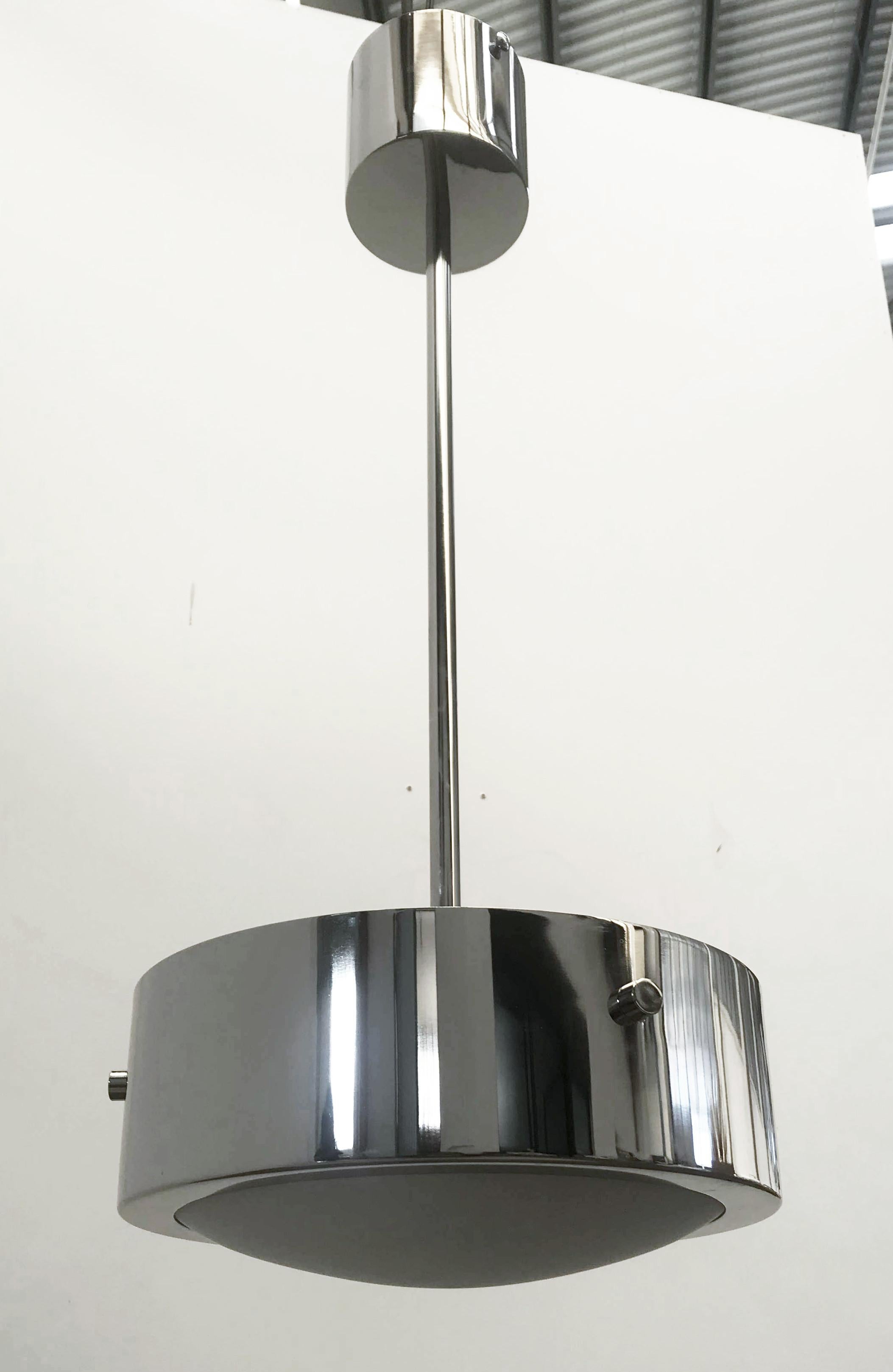 Italian pendant with Murano glass shade enclosed in metal band / Made in Italy
Designed by Fabio Ltd, inspired by Angelo Lelli and Arredoluce styles
1 light / E12 or E14 type / max 40W each
Height: 26.5 inches including rod and canopy / Diameter: 12