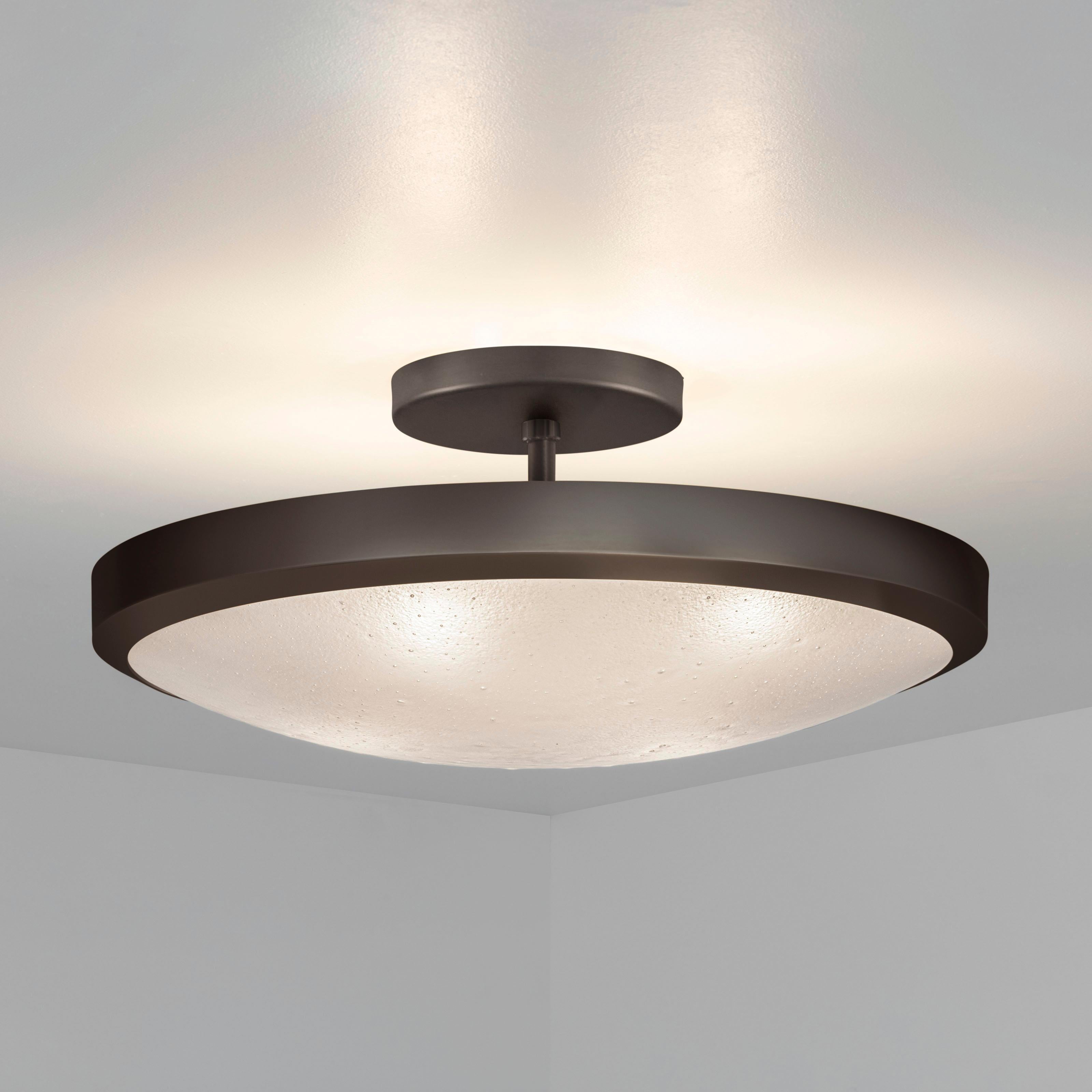 The Uno ceiling light exemplifies simple elegance via its clean profile designed around a single Murano glass shade.

Starting pricing by size-premium finishes have a 10%