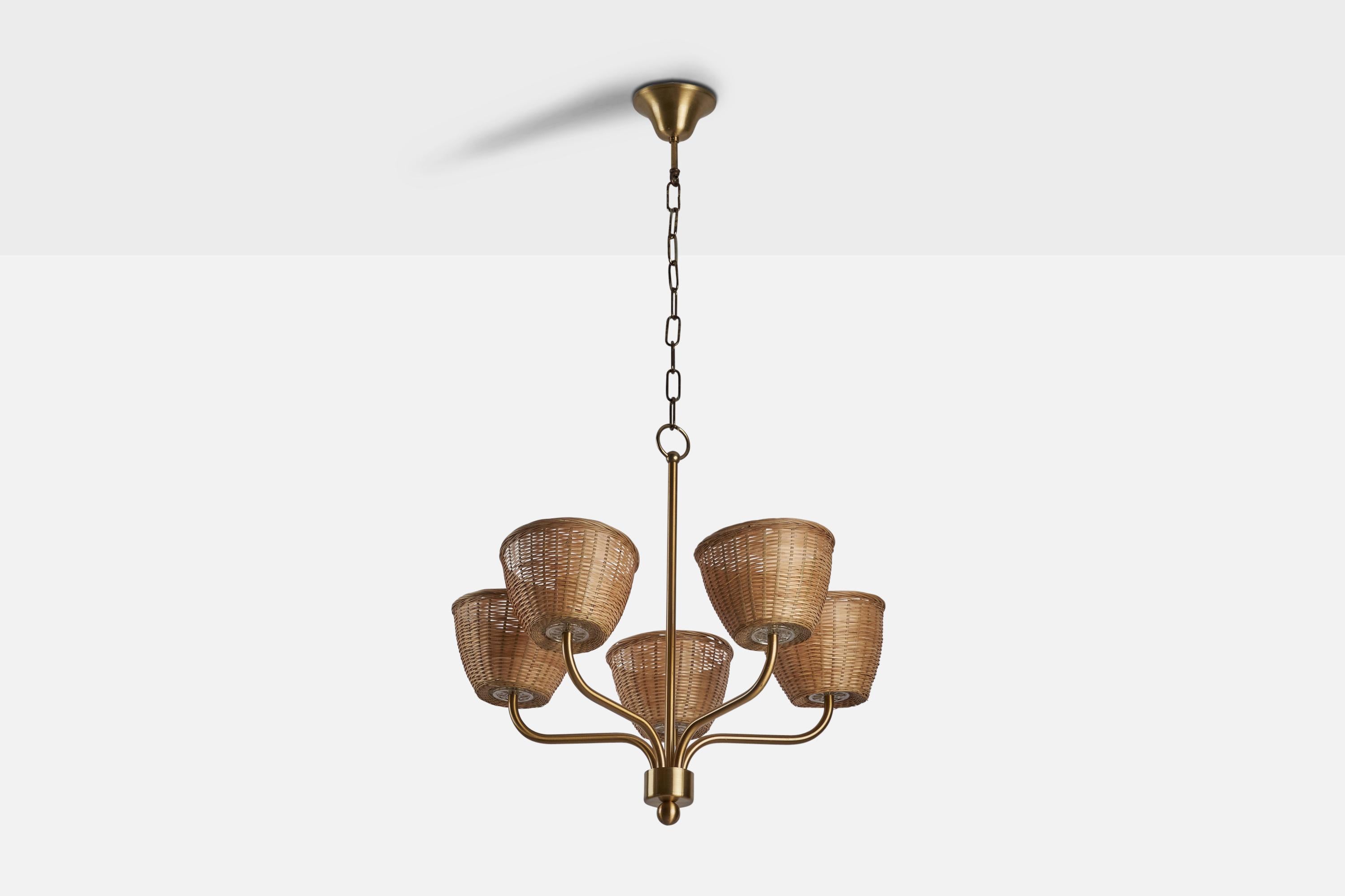 
A brass and rattan chandelier designed by Uno Kristiansson and produced by Luxus, Vittsjö, Sweden, c. 1960s.
Dimensions of canopy (inches) : 2.14” H x 2.38” Diameter
Socket takes standard E-26 bulbs. 5 sockets.There is no maximum wattage stated on