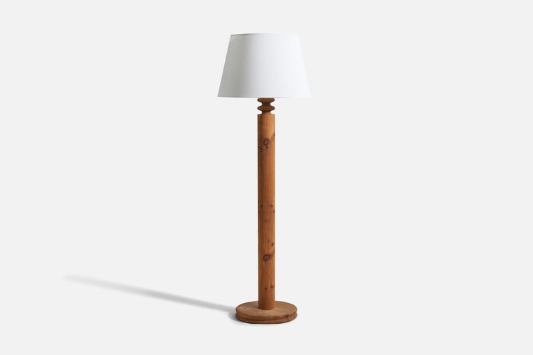 A solid turned pine floor lamp designed by Uno Kristiansson, for Luxus, Sweden, 1970s.

Stated dimensions exclude lampshade. Upon request illustrated lampshade can be included in purchase.