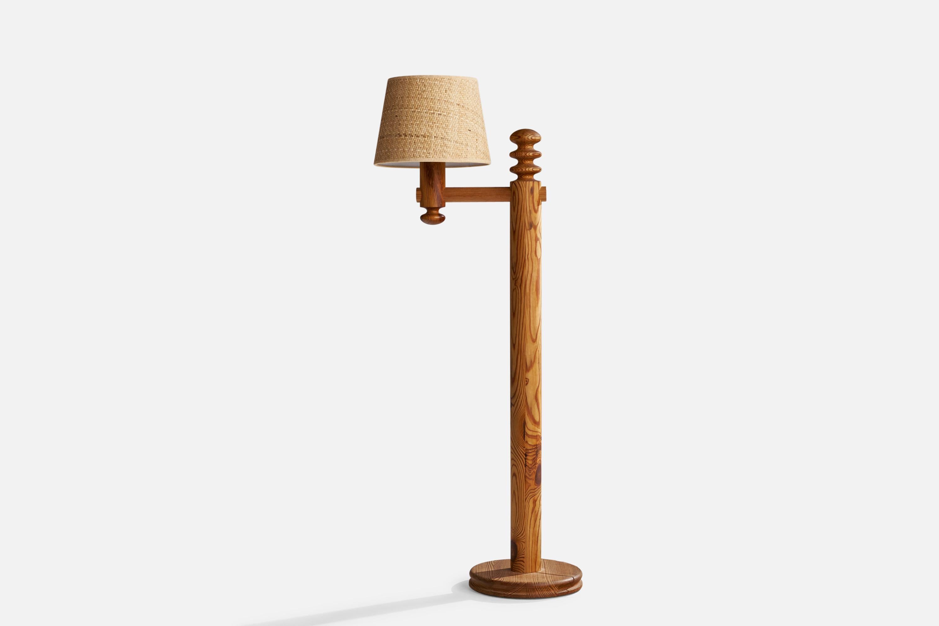 A pine and rattan floor lamp designed by Uno and Östen Kristiansson an produced by Luxus, Vittsjö, Sweden, 1970s.

Overall Dimensions (inches): 54” H x 12” W x 23” D
Stated dimensions include shade.
Bulb Specifications: E-26 Bulb
Number of Sockets: