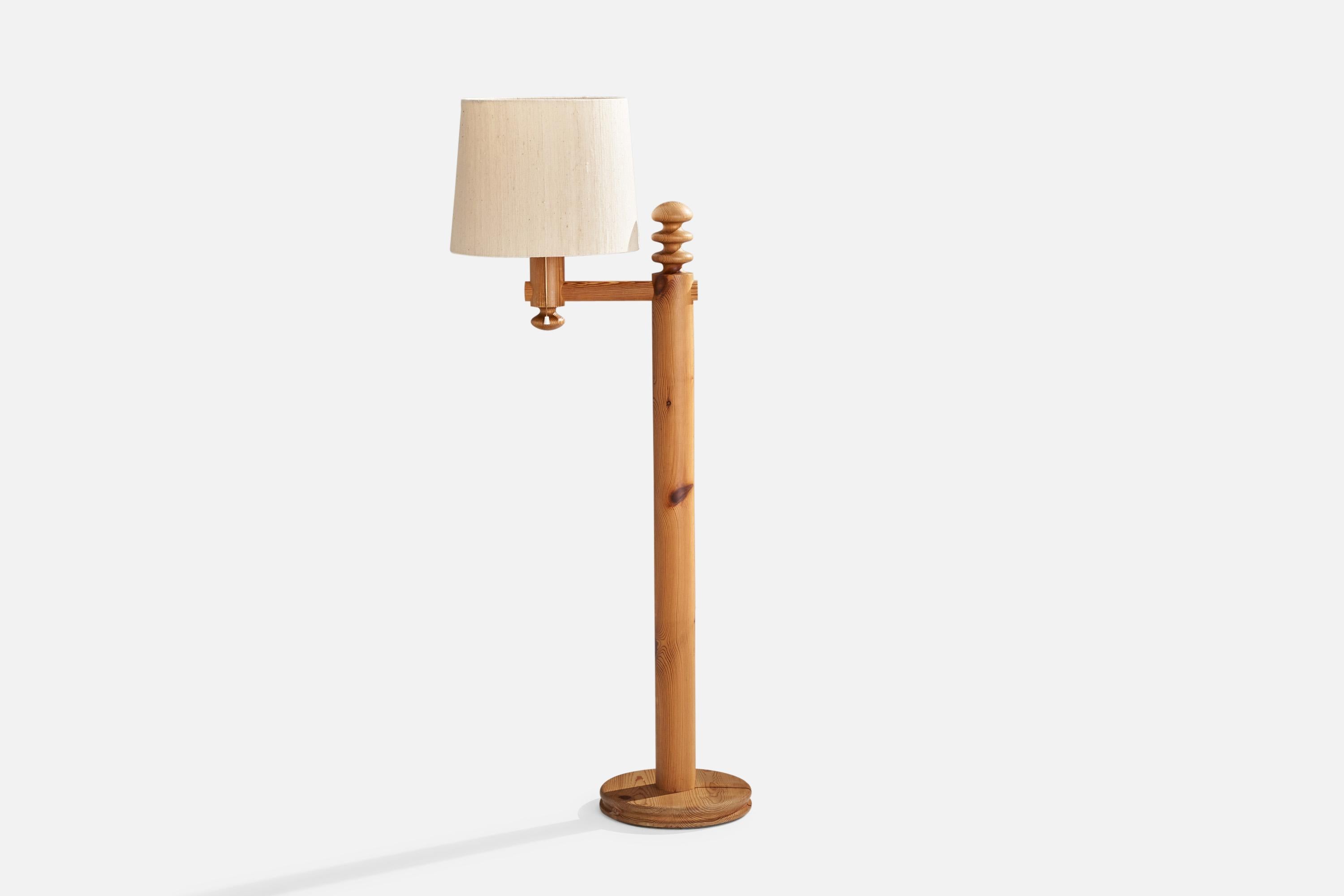 A pine and rattan floor lamp designed by Uno and Östen Kristiansson and produced by Luxus, Vittsjö, Sweden, 1970s.

Overall Dimensions (inches): 56.125” H x 14.75”W x 25.75” D
Stated dimensions include shade.
Bulb Specifications: E-26 Bulb
Number of