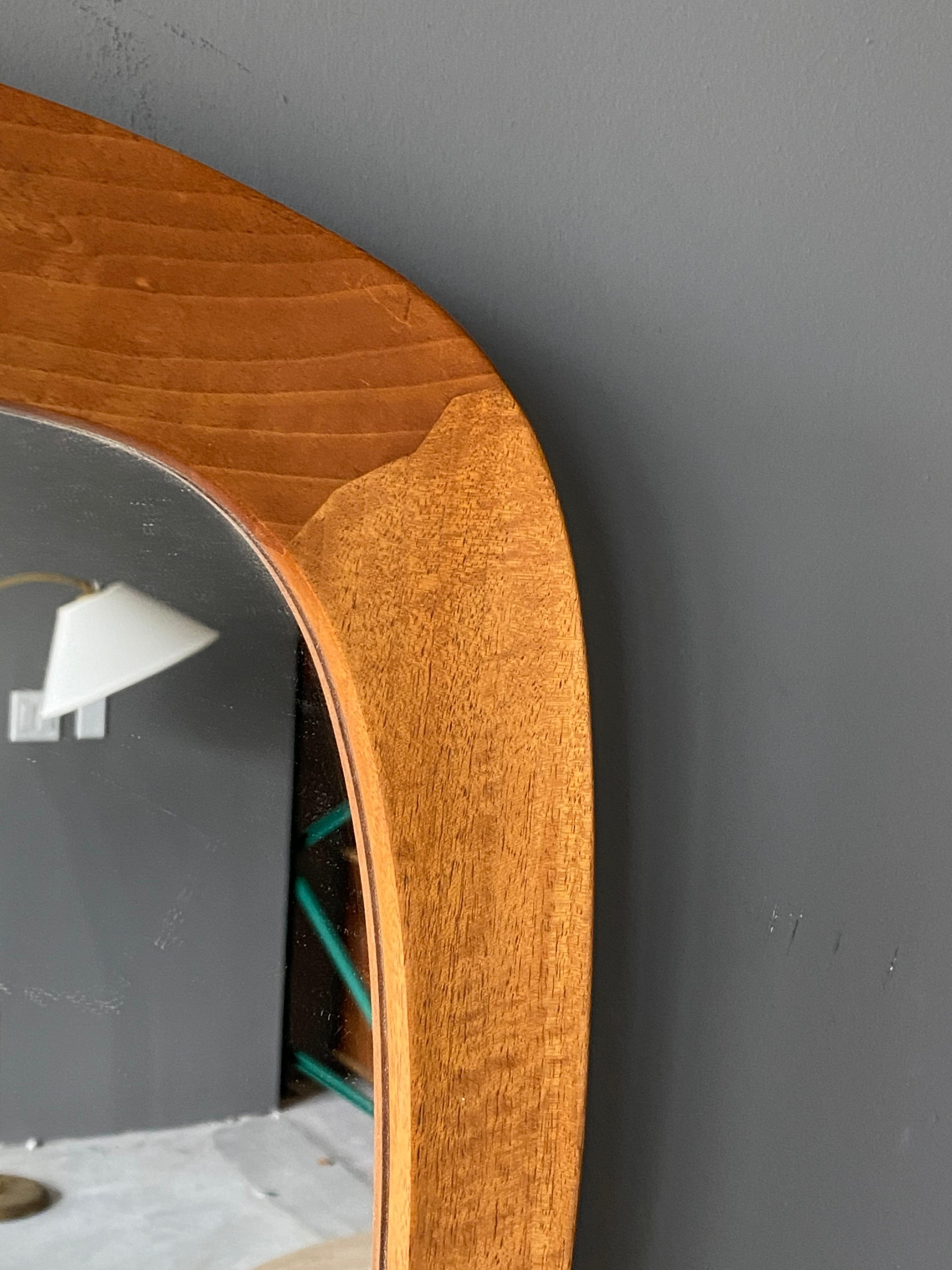 Uno Kristiansson, Organic Wall Mirror, Stained Oak, Vittsjö Möbel, Sweden, 1960s In Good Condition In High Point, NC
