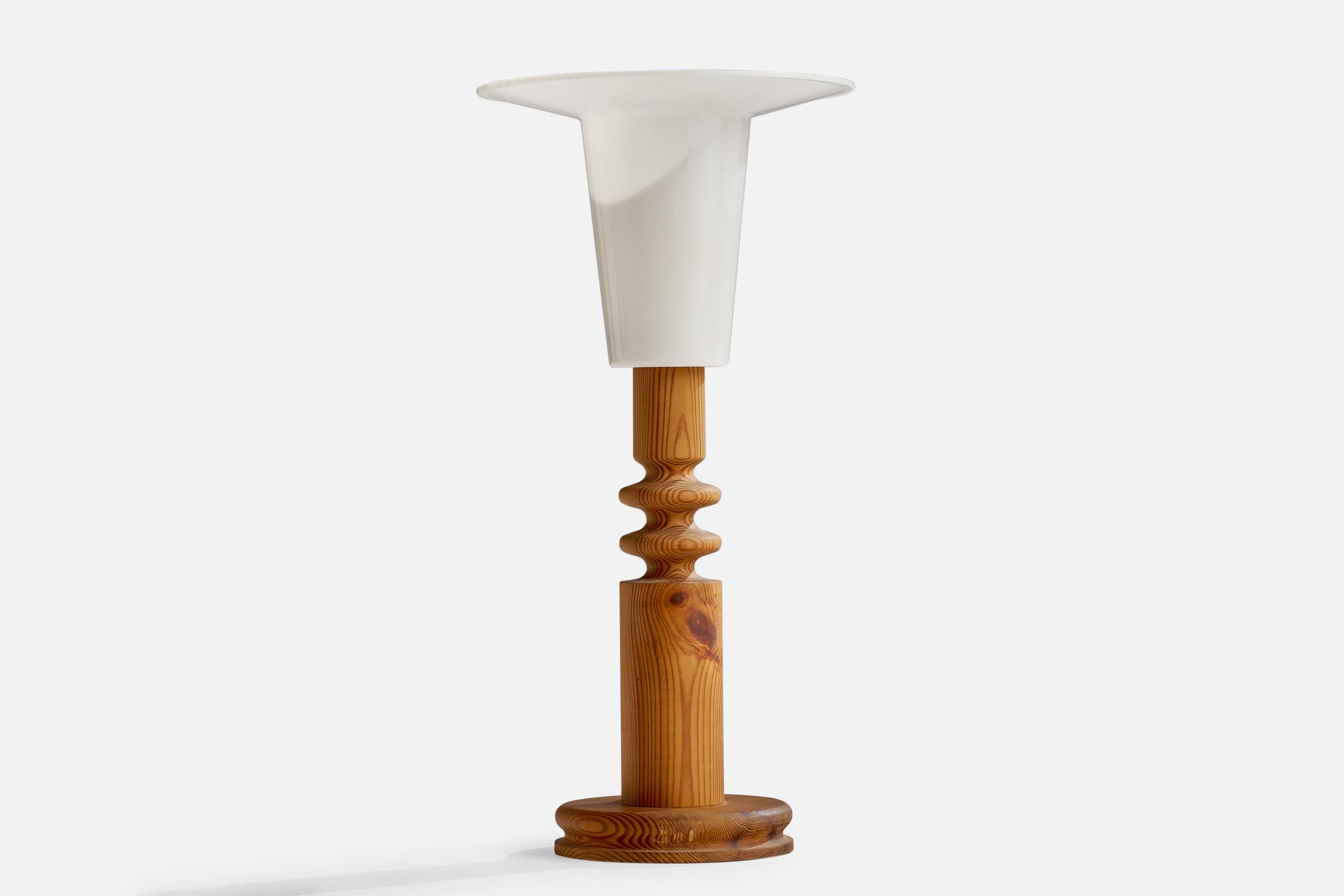 A pine and acrylic table lamp designed by Uno and Östen Kristiansson and produced by Luxus, Vittsjö, Sweden, 1970s.

Overall Dimensions (inches): 25.25” H x 12.50” W x 7.75” D
Stated dimensions include shade.
Bulb Specifications: E-26 Bulb
Number of
