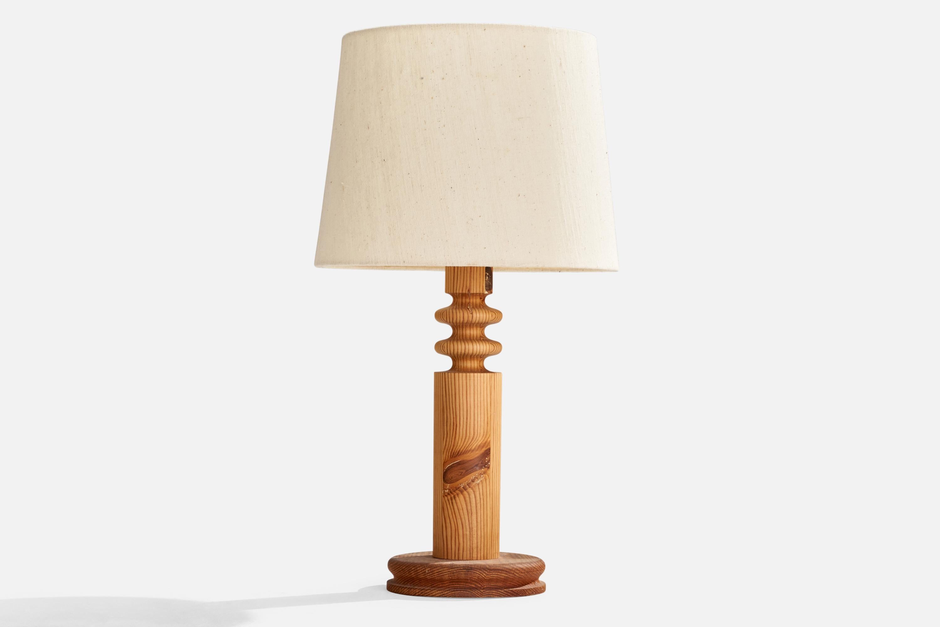 A pine, acrylic and off white fabric table lamp designed by Uno Kristiansson and produced by Luxus, Sweden, 1970s.
Overall Dimensions (inches): 27.75” H x 14.75” W x 16.625” D
Stated dimensions include shade.
Bulb Specifications: E-26 Bulb
Number of