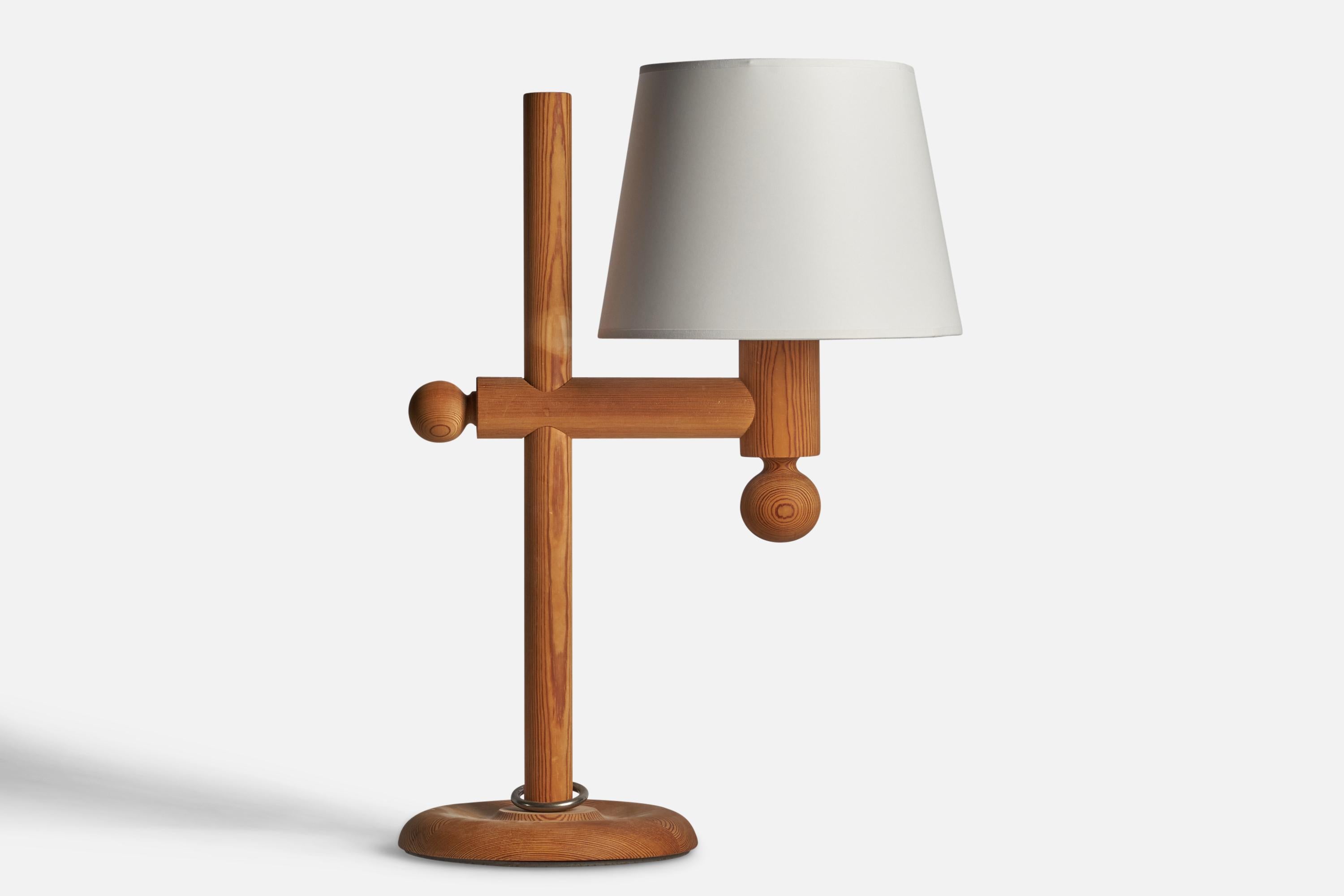 A pine table lamp designed by Uno Kristiansson and produced by Luxus Vittsjö, Sweden, 1970s.

Dimensions of Lamp (inches): 25.25” H x 9.75” W x 13.5” D

Dimensions of Shade (inches): 9” Top Diameter x 12” Bottom Diameter x 9” H 

Dimensions of Lamp