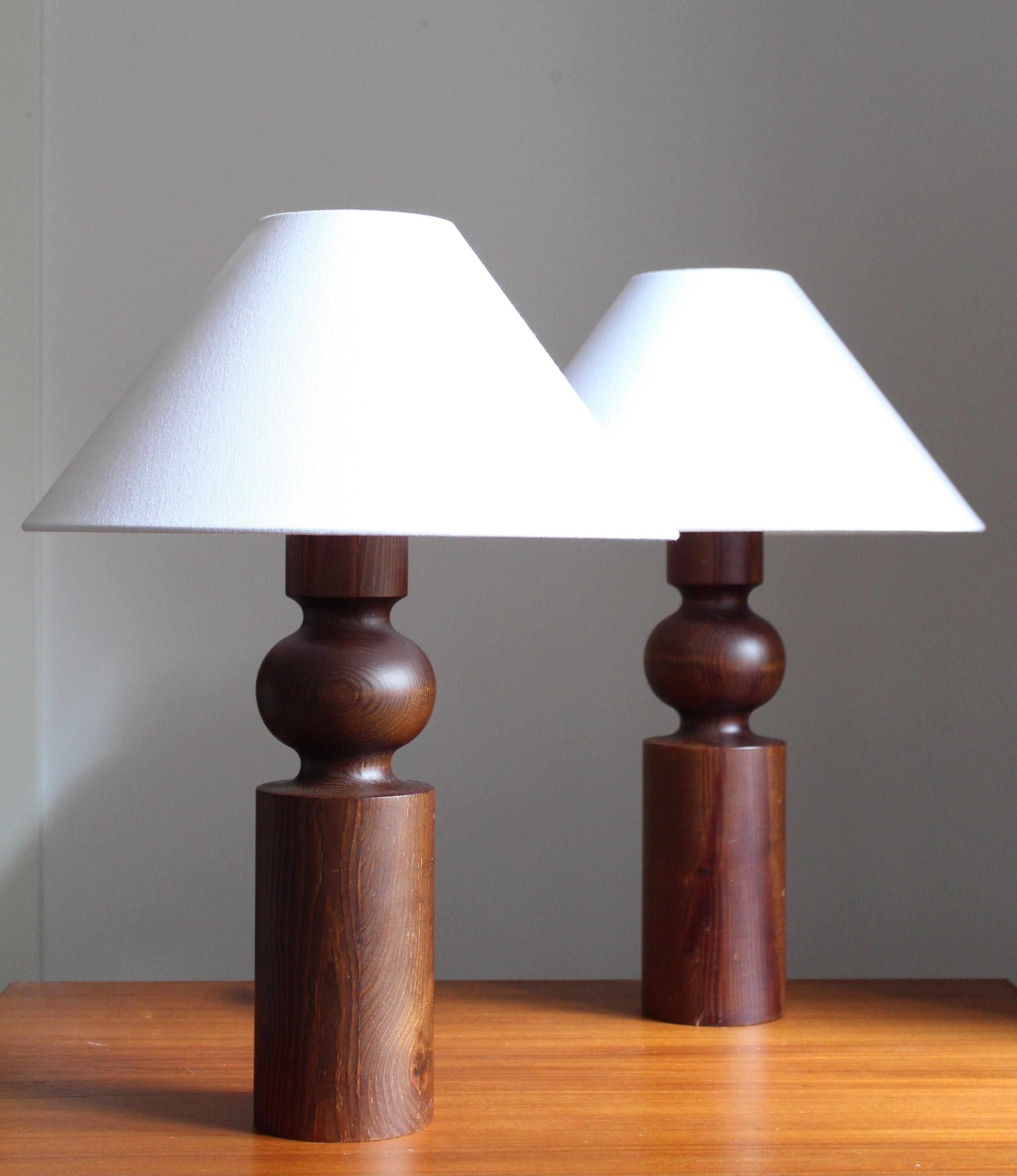 A pair of solid pine table lamps. Designed by Uno Kristiansson, for Luxus, Sweden, 1960s.

Sold without lampshades.

Other designers of the period include Axel Einar Hjorth, Roland Wilhelmsson, Charlotte Perriand, Pierre Chapo, and Yasha Heifetz.