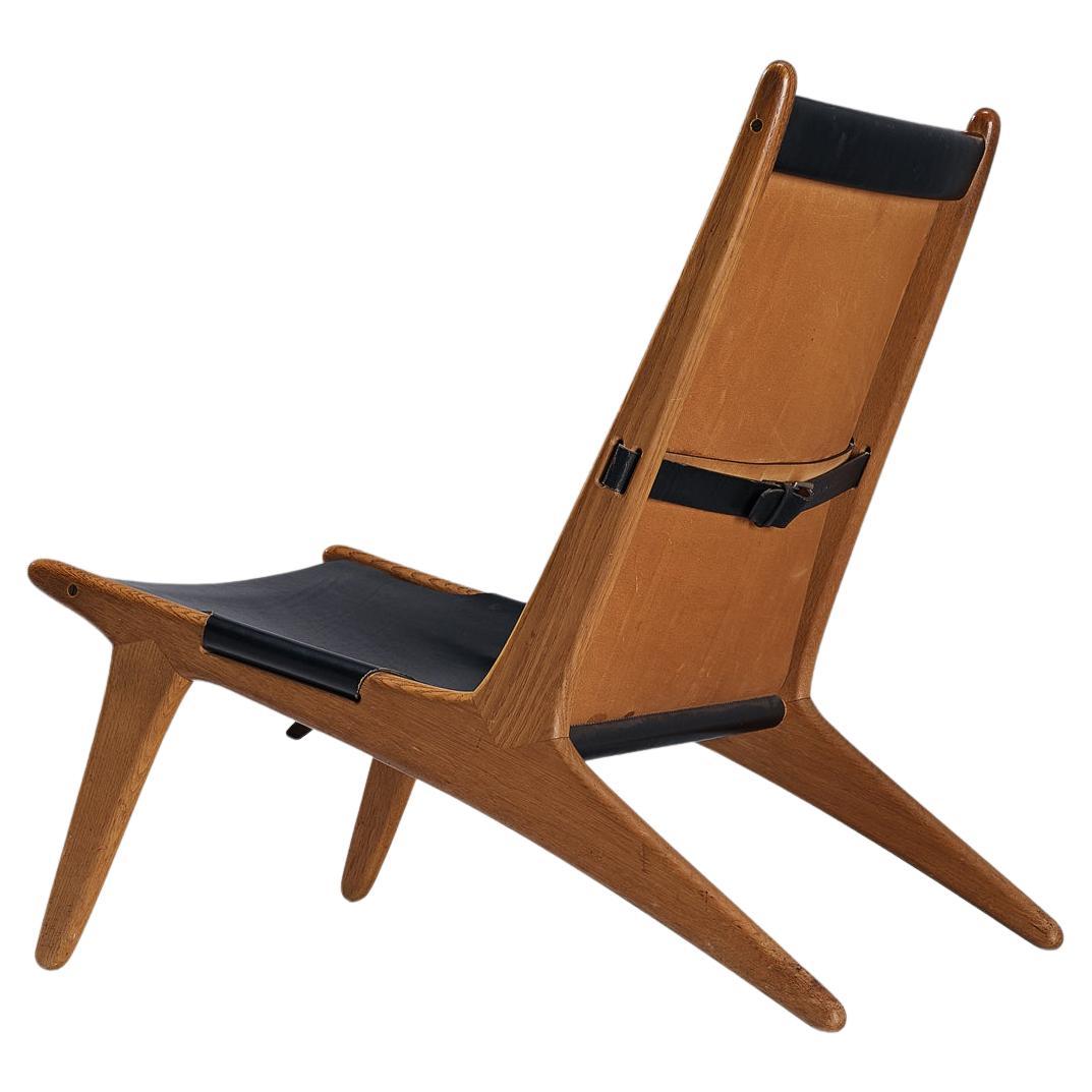 Uno & Östen Kristiansson pour Luxus Chaise de chasse en cuir et chêne
