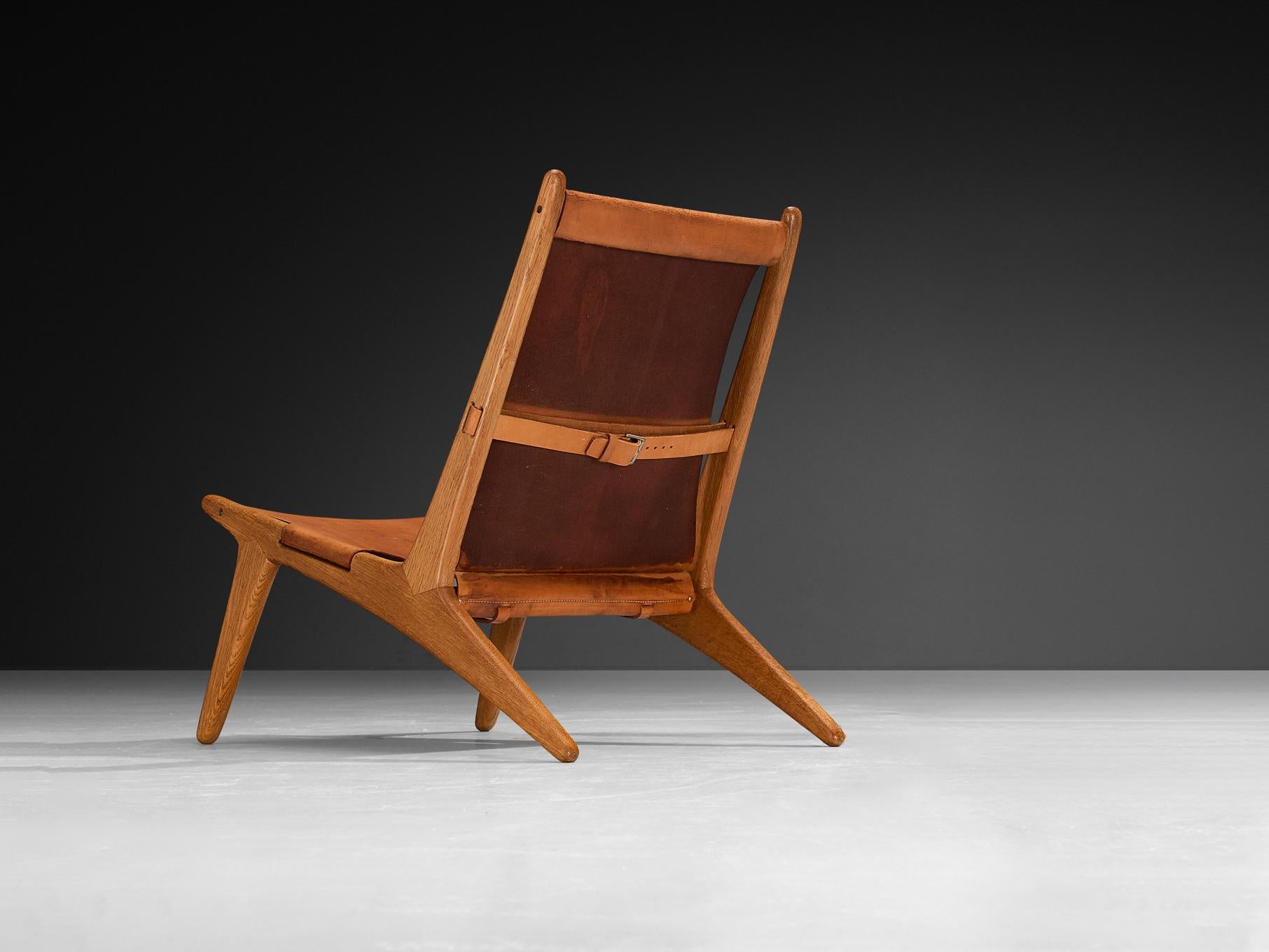 Uno & Östen Kristiansson for Luxus, hunting chair, model '204', leather, oak, Sweden, 1954

Swedish hunting chair designed by Uno & Östen Kristiansson in the fifties. This unique design has a very strong appearance. The sleek construction and thick