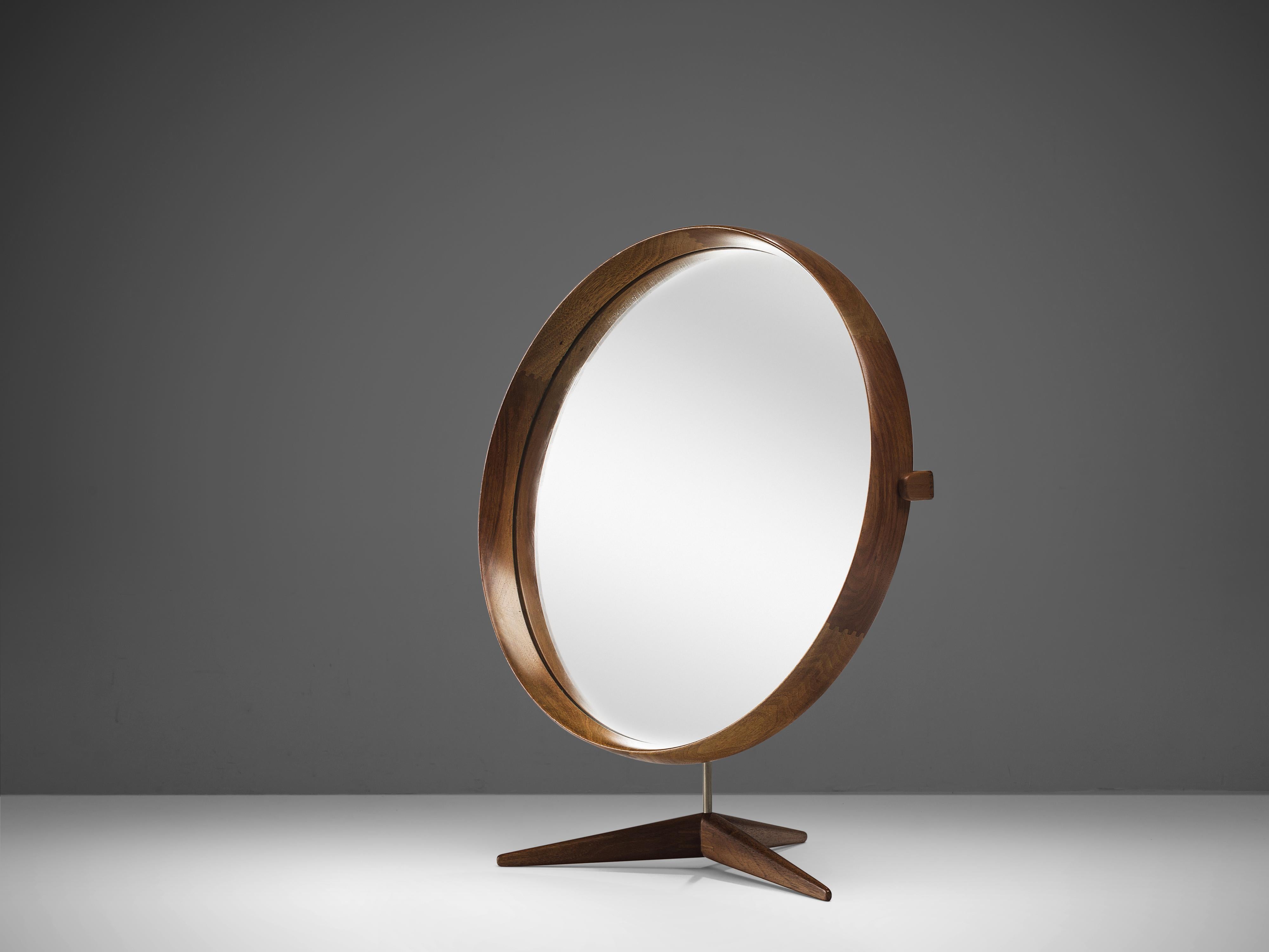 Uno & Östen Kristiansson for Luxus, table, mirror, walnut, steel, Sweden, 1960s

This round table mirror was designed by Uno & Östen Kristiansson for Luxus. The mirrored glass is surrounded by a frame of walnut. It is adjustable in the angle.