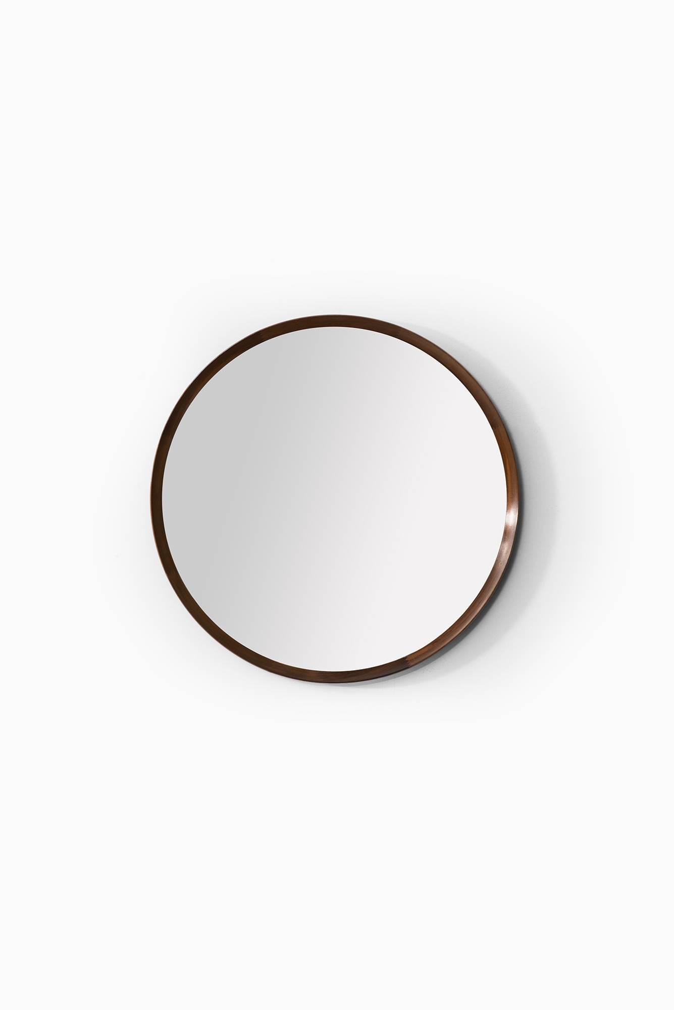 Seltener Spiegel aus Palisanderholz, entworfen von Uno & Östen Kristiansson. Produziert von Luxus in Vittsjö, Schweden.