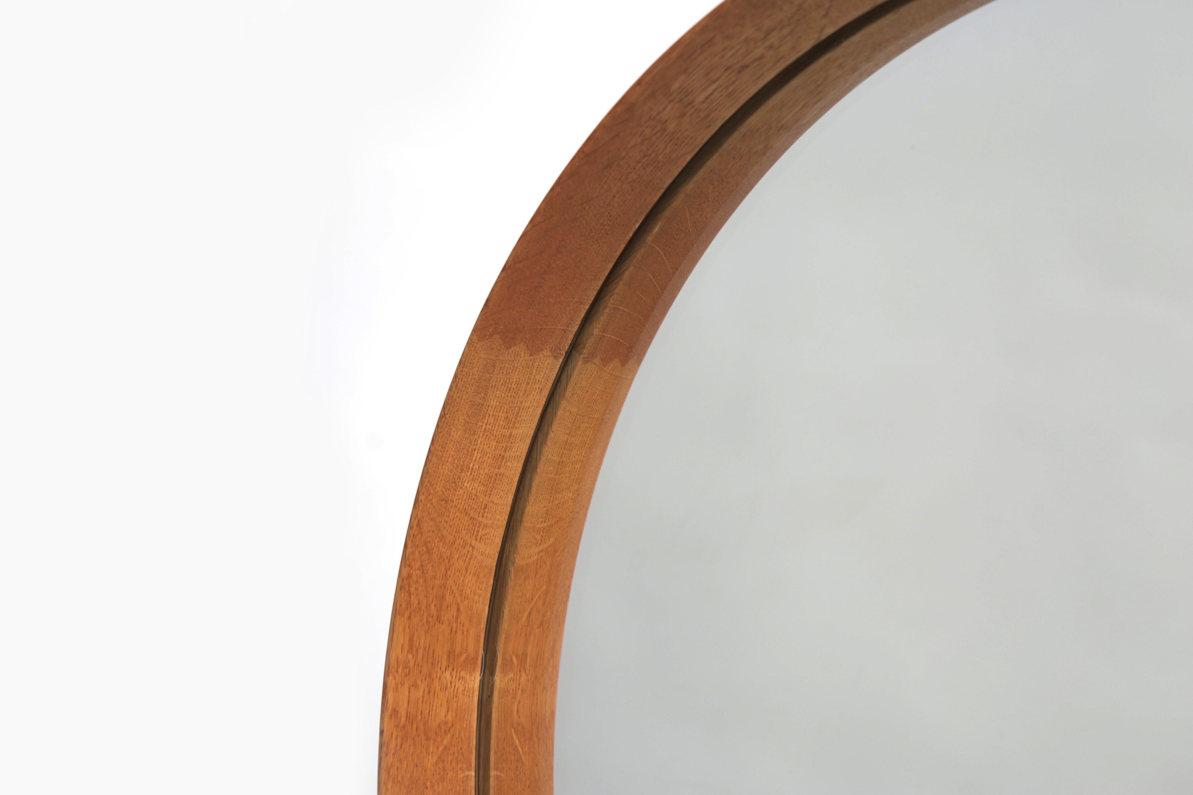 Uno & Östen Kristiansson oak table mirror model 406 by Luxus, Sweden, 1960s.

This large framed table mirror in oak is balanced on a wooden stand that pivots on an adjustable oakwood frame.

Designed by Uno & Östen Kristiansson. Manufactured by