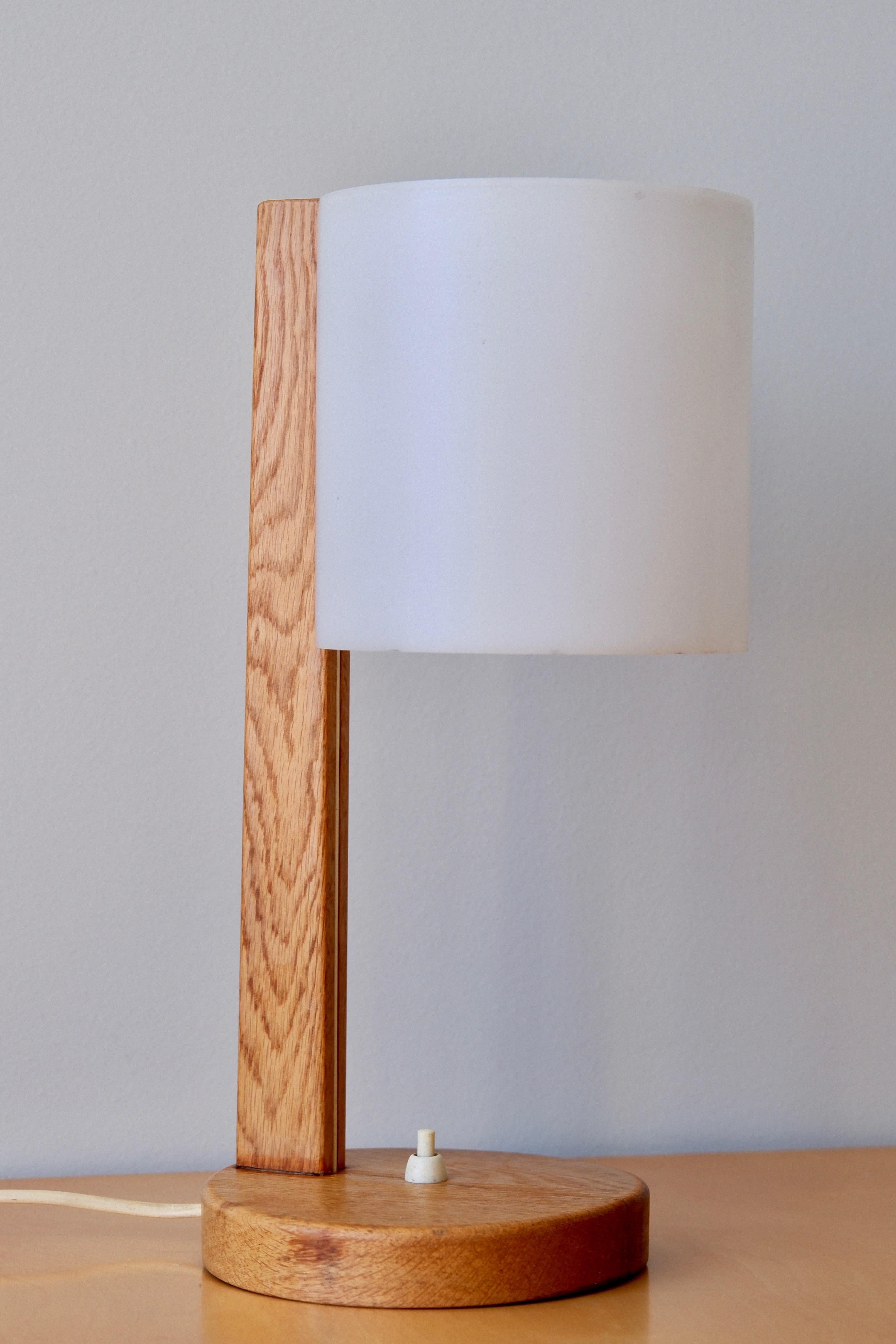 Uno & Östen Kristiansson, Prototype table lamp for Luxus, 1960s. Really unusual table lamp design by Uno & Östen Kristiansson for Luxus in the 60's as a prototype. The official design of the model lamp is with a square foot. This prototype has been