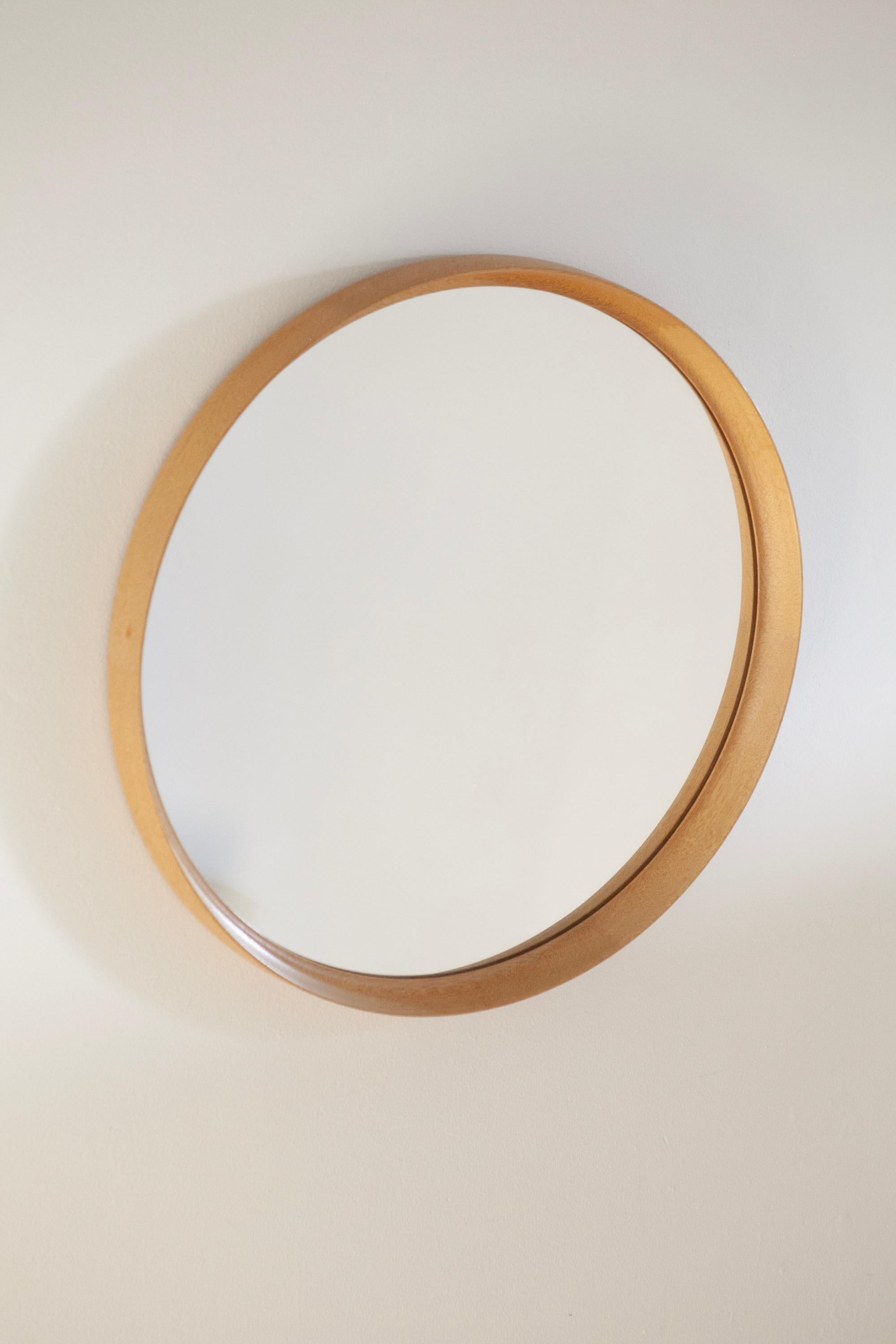 Uno & Östen Kristiansson, Round Oak mirror by Luxus, Vittsjö. Sweden, 1960s

This stunning vintage round European oak mirror is exquisitely framed in solid oak grain. Made in Sweden in the 1960s this is fantastic piece for an entrance way or dining