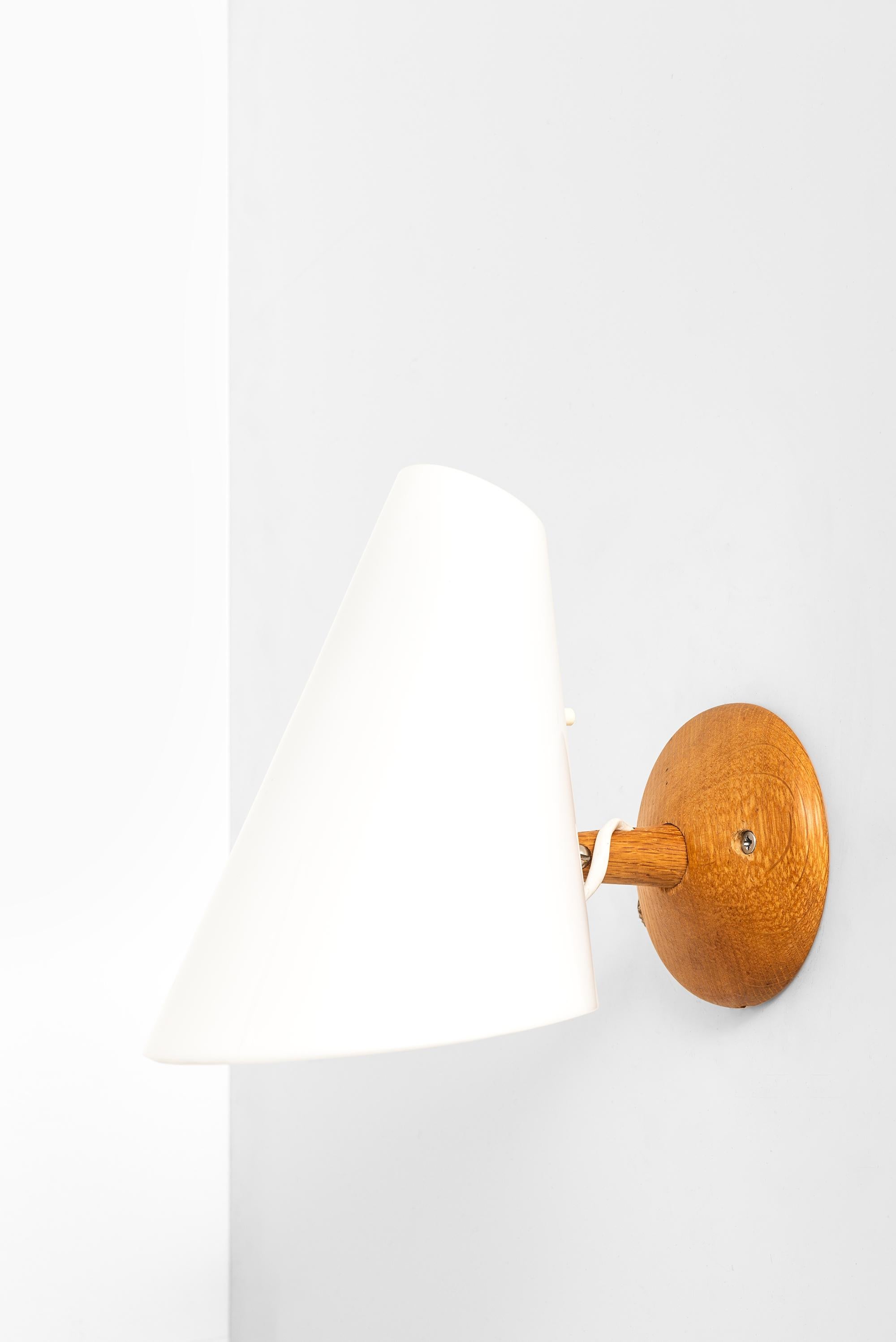 Rare wall lamps designed by Uno & Östen Kristiansson. Produced by Luxus in Vittsjö, Sweden.

The listed price is for one lamp, there are 3 lamps available.