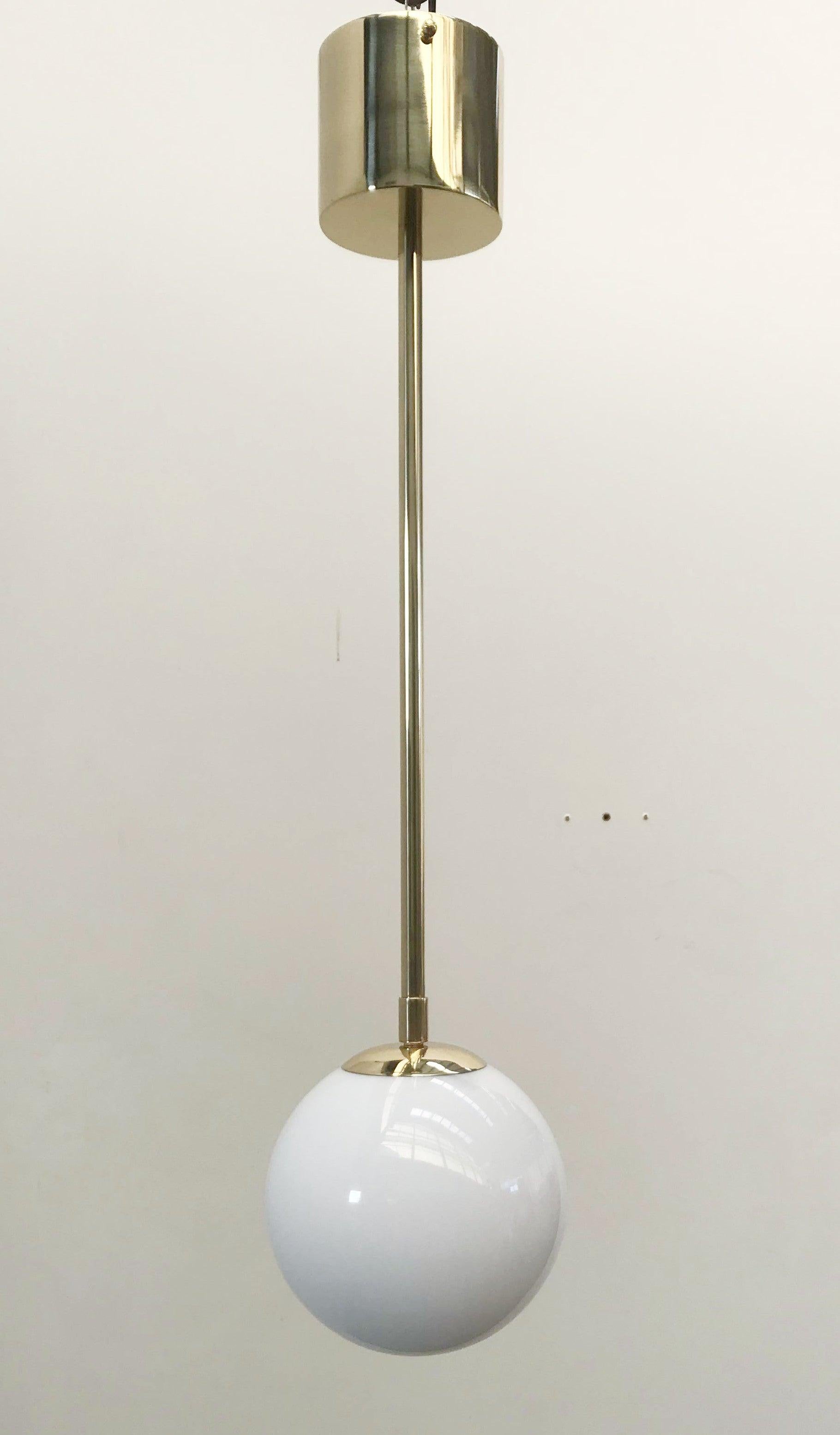 Italian pendant with Murano glass globe mounted on brass frame / Made in Italy

Designed by Fabio Ltd, inspired by Angelo Lelli and Arredoluce styles

1 light / E12 or E14 type / max 40W each

Height: 29.5 inches / Diameter: 8 inches

Order Only /