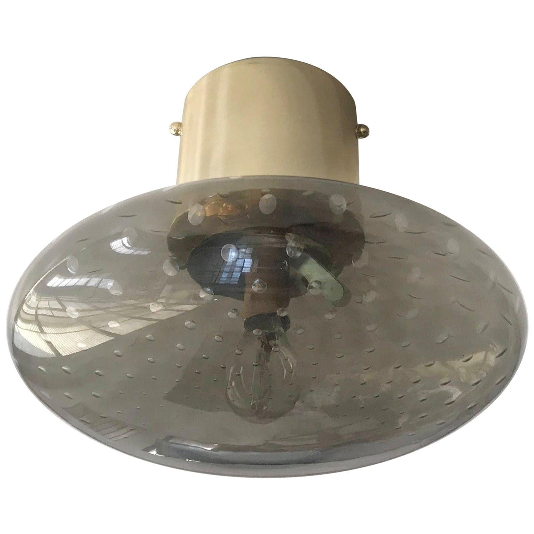 Italian flush mount with Murano glass shade and brass frame / Made in Italy
Designed by Fabio Ltd, inspired by Angelo Lelli and Arredoluce styles
1 light / E12 or E14 type / max 40W each
Diameter: 12 inches / Height: 9.5 inches
Order only / This