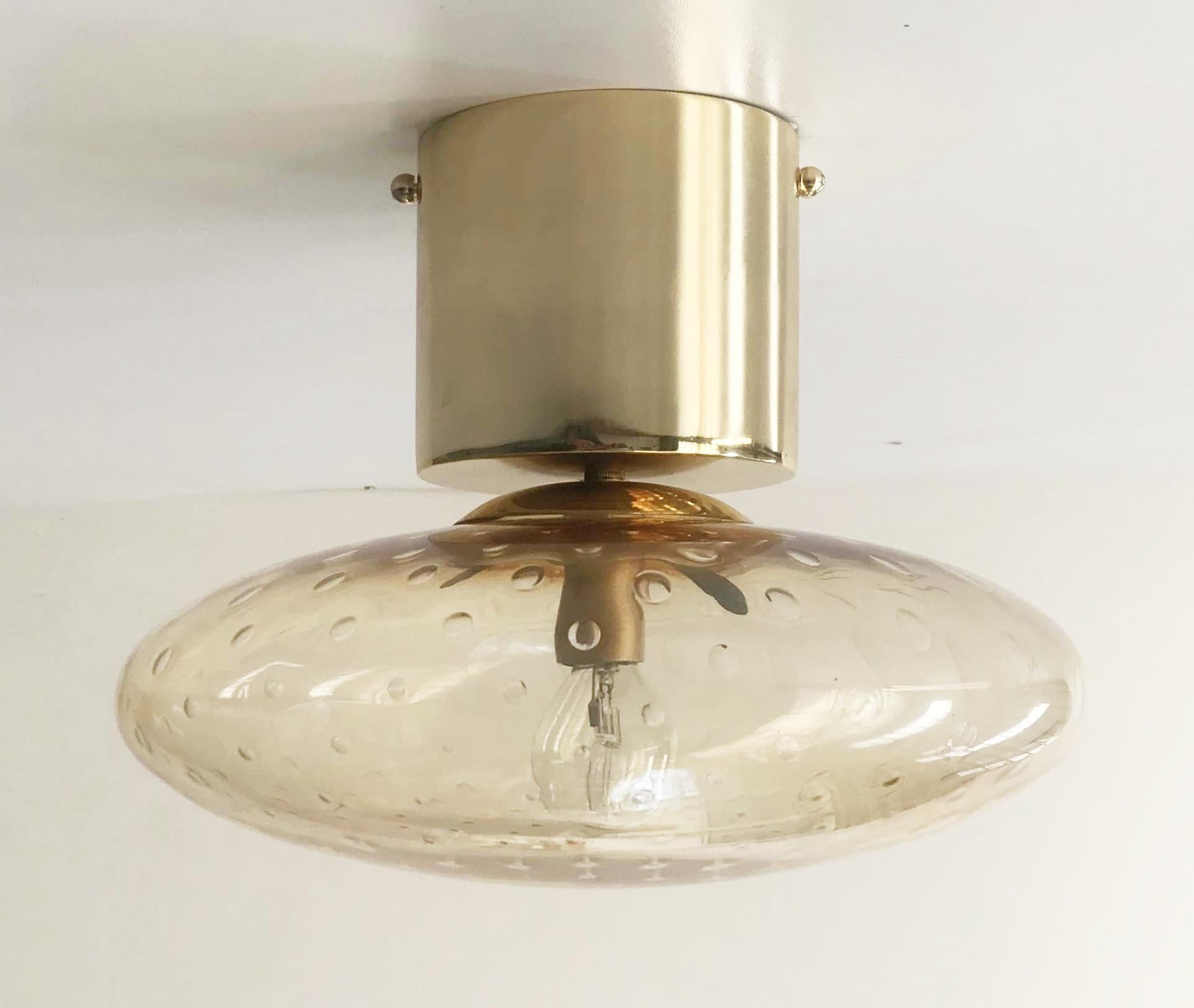 Italian flush mount with Murano glass shade and brass frame / Made in Italy
Designed by Fabio Ltd, inspired by Angelo Lelli and Arredoluce styles
1 light / E12 or E14 type / max 40W each
Diameter: 12 inches / Height: 9.5 inches
Order only / This