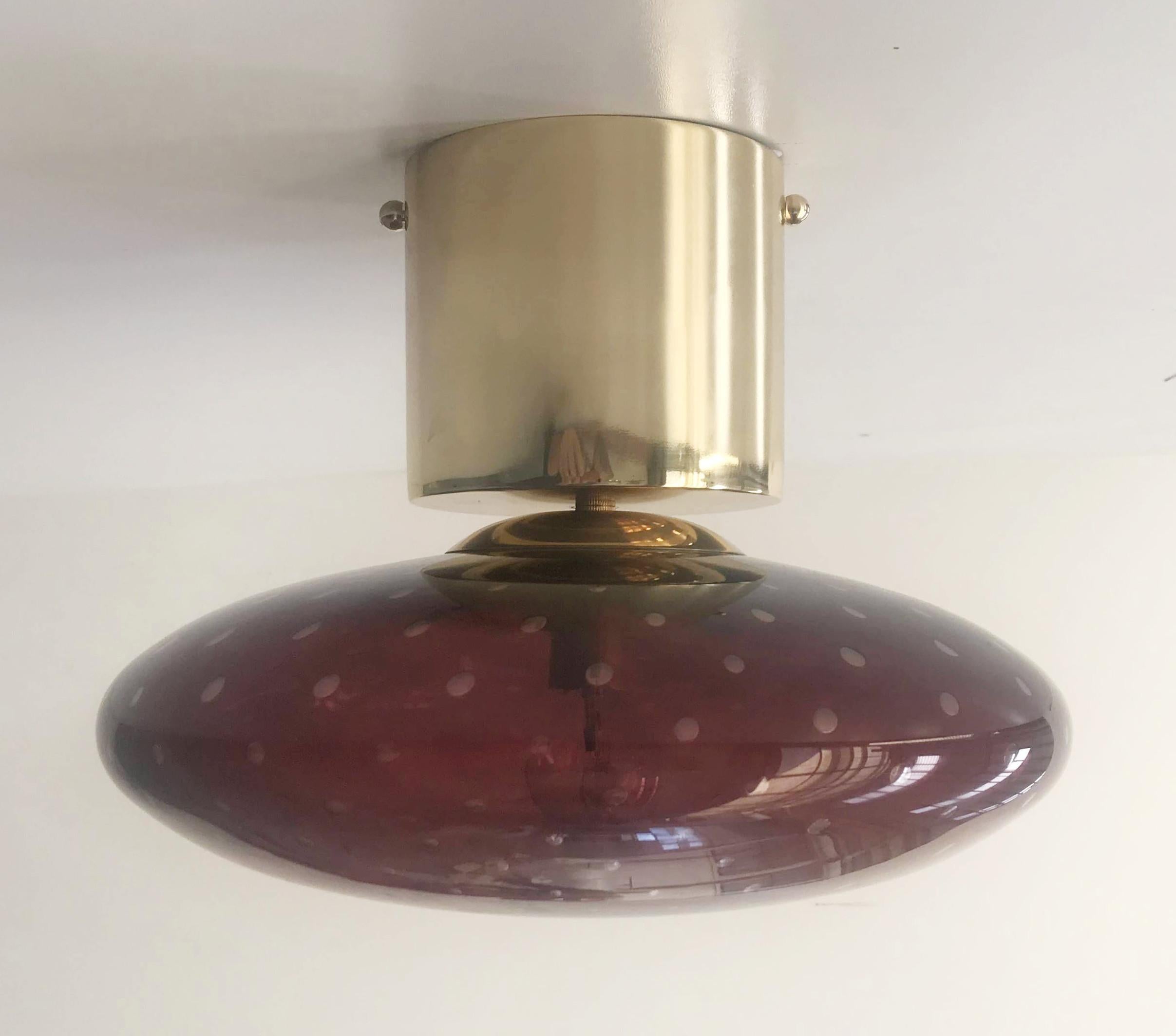 Italian flush mount with Murano glass shade and brass frame / Made in Italy
Designed by Fabio Ltd, inspired by Angelo Lelli and Arredoluce styles
1 light / E12 or E14 type / max 40W each
Diameter: 12 inches / Height: 9.5 inches
Order only / This