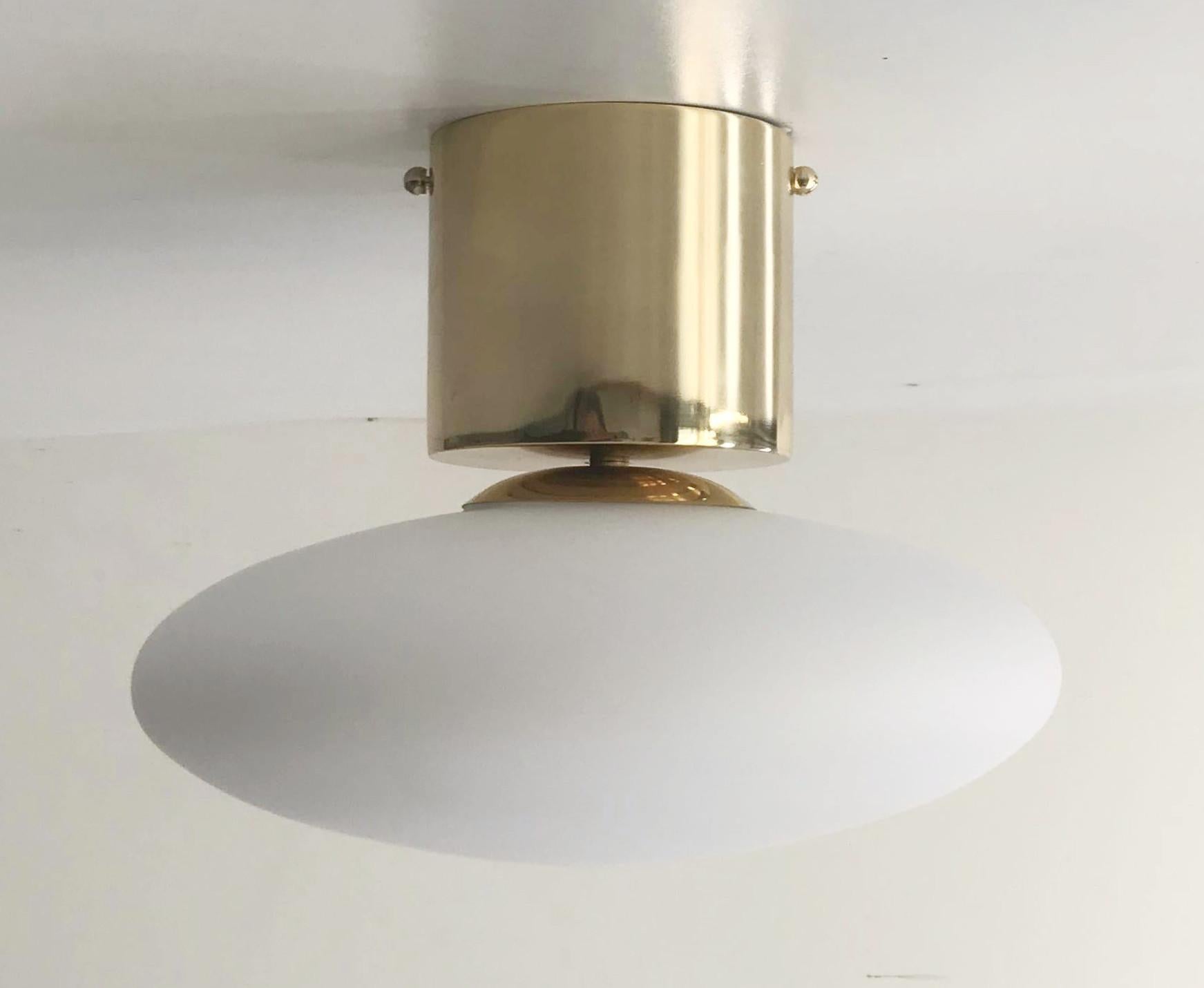 Italian flush mount with Murano glass shade and brass frame / Made in Italy
Designed by Fabio Ltd, inspired by Angelo Lelli and Arredoluce styles
1 light / E12 or E14 type / max 40W each
Diameter: 12 inches / Height: 9.5 inches
Order only / This