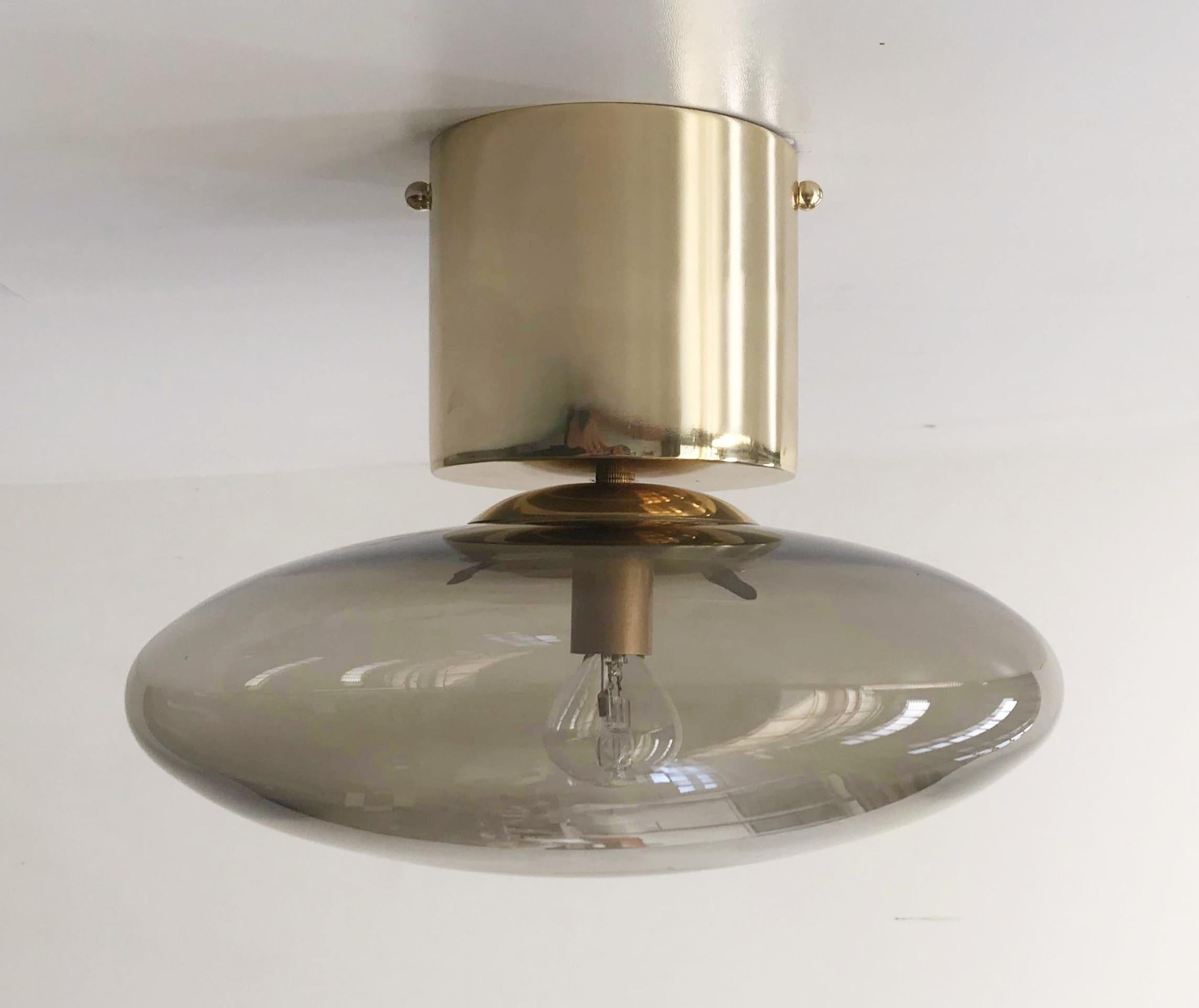 Italian flush mount with Murano glass shade and brass frame / Made in Italy
Designed by Fabio Ltd, inspired by Angelo Lelli and Arredoluce styles
1 light / E12 or E14 type / max 40W each
Diameter: 12 inches / Height: 9.5 inches
Order only / This