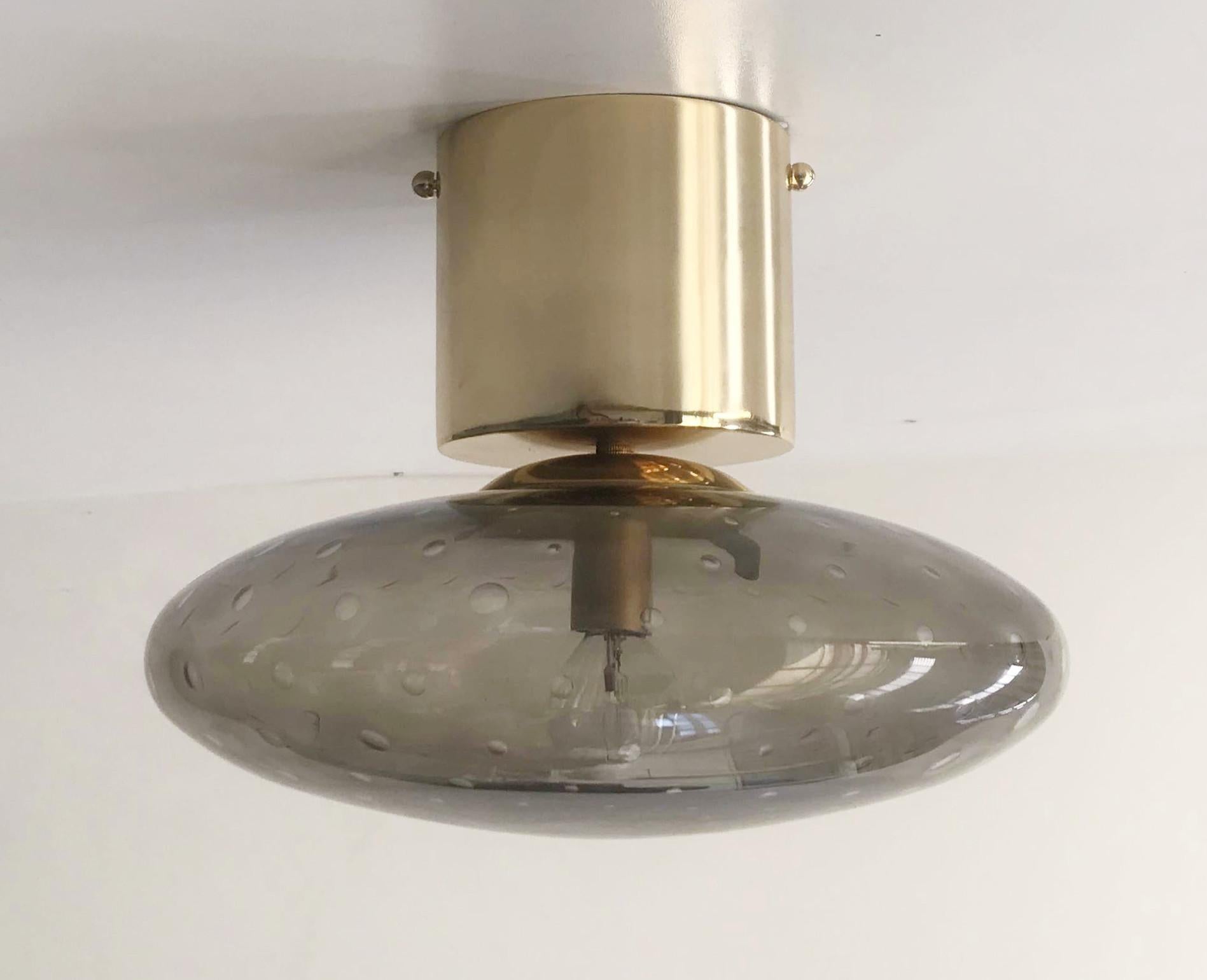 Italian flush mount with Murano glass shade and brass frame / Made in Italy
Designed by Fabio Ltd, inspired by Angelo Lelli and Arredoluce styles
1 light / E12 or E14 type / max 40W each
Diameter: 12 inches / Height: 9.5 inches
Order only / This