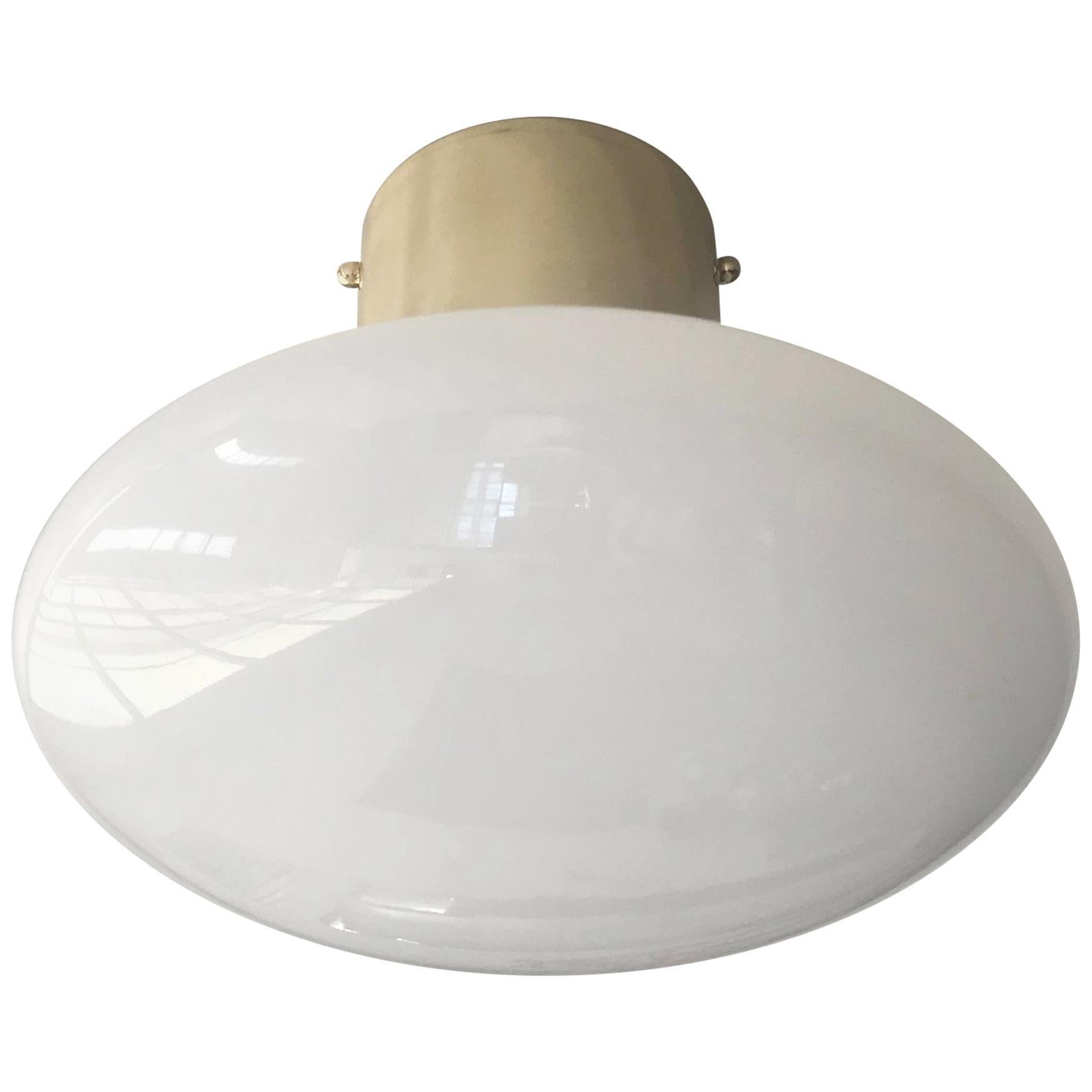 Italian flush mount with Murano glass shade and brass frame / Made in Italy
Designed by Fabio Ltd, inspired by Angelo Lelli and Arredoluce styles
1 light / E12 or E14 type / max 40W each
Diameter: 12 inches / Height: 9.5 inches
Order only / This