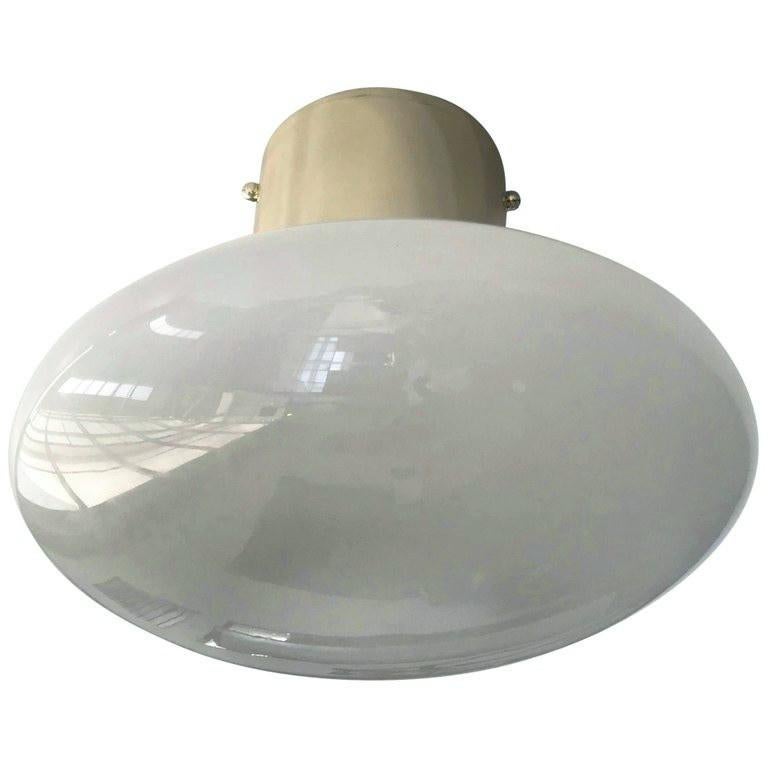 Italian flush mount with Murano glass shade and brass frame / Made in Italy
Designed by Fabio Ltd, inspired by Angelo Lelli and Arredoluce styles
1 light / E12 or E14 type / max 40W each
Diameter: 12 inches / Height: 9.5 inches
Order only / This