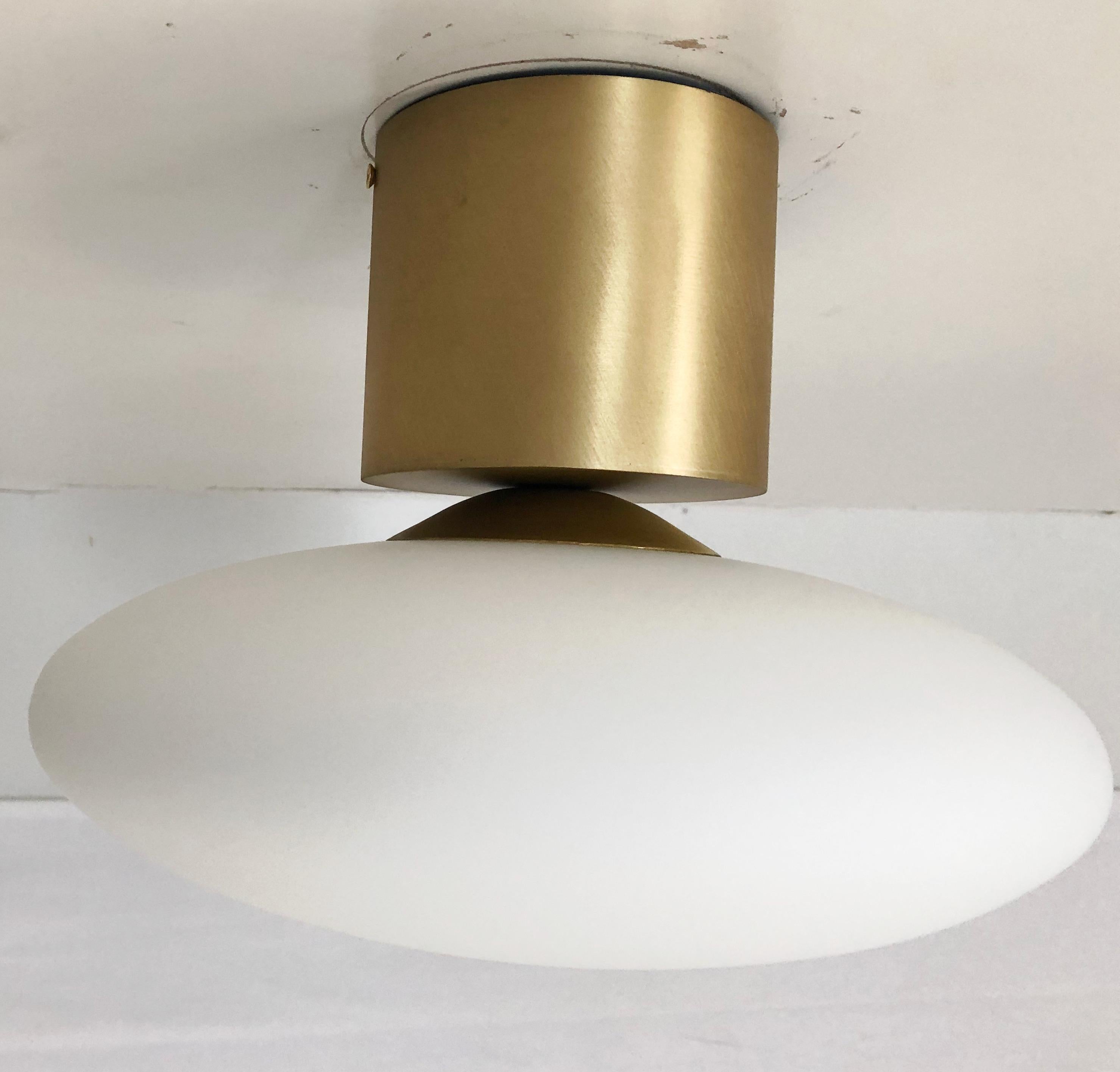 Italian flush mount with Murano glass shade and brass frame / Made in Italy
Designed by Fabio Ltd, inspired by Angelo Lelli and Arredoluce styles
1 light / E12 or E14 type / max 40W each
Diameter: 12 inches / Height: 9.5 inches
Order only / This