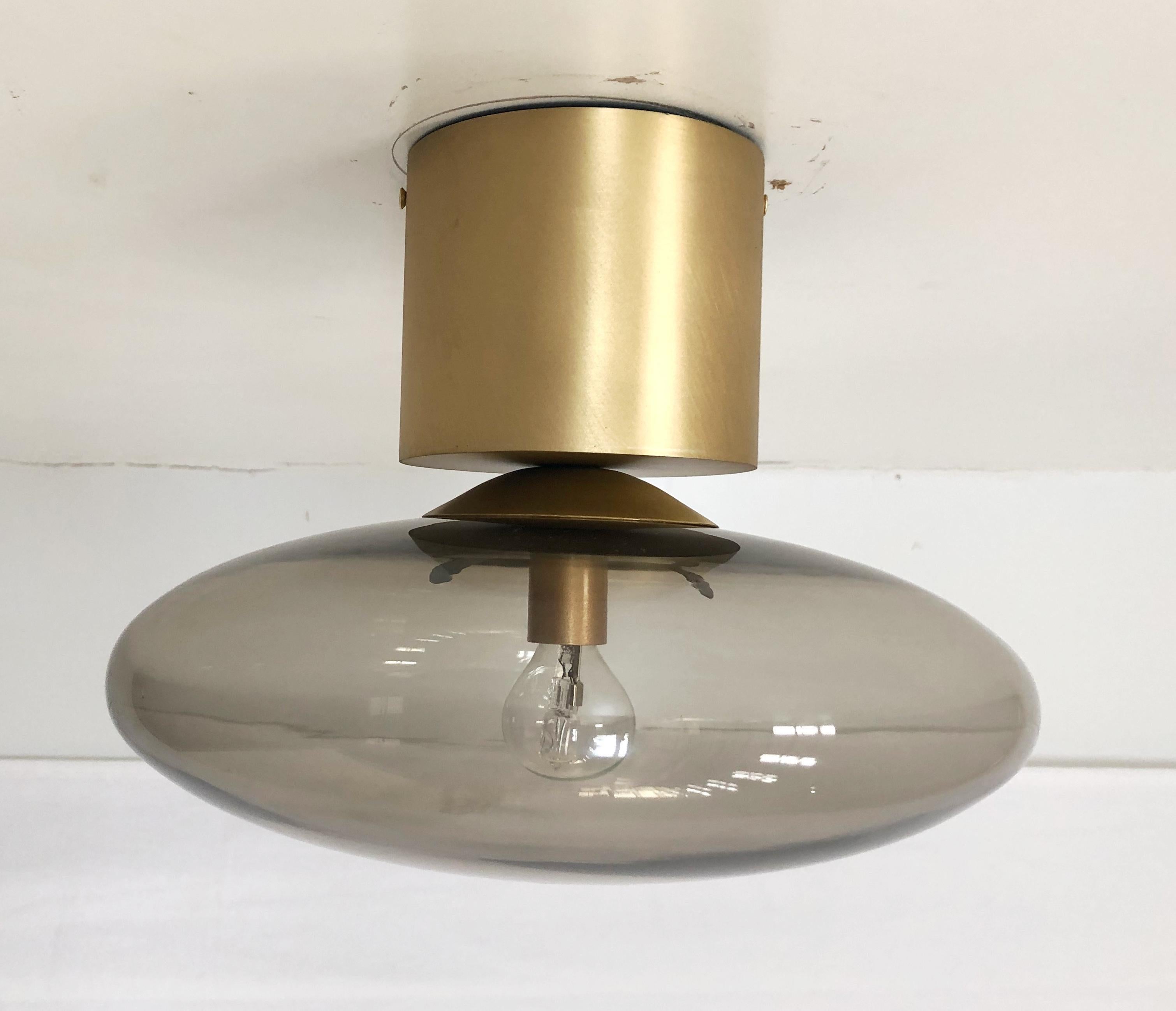 Italian flush mount with Murano glass shade and brass frame / Made in Italy
Designed by Fabio Ltd, inspired by Angelo Lelli and Arredoluce styles
1 light / E12 or E14 type / max 40W each
Diameter: 12 inches / Height: 9.5 inches
Order only / This