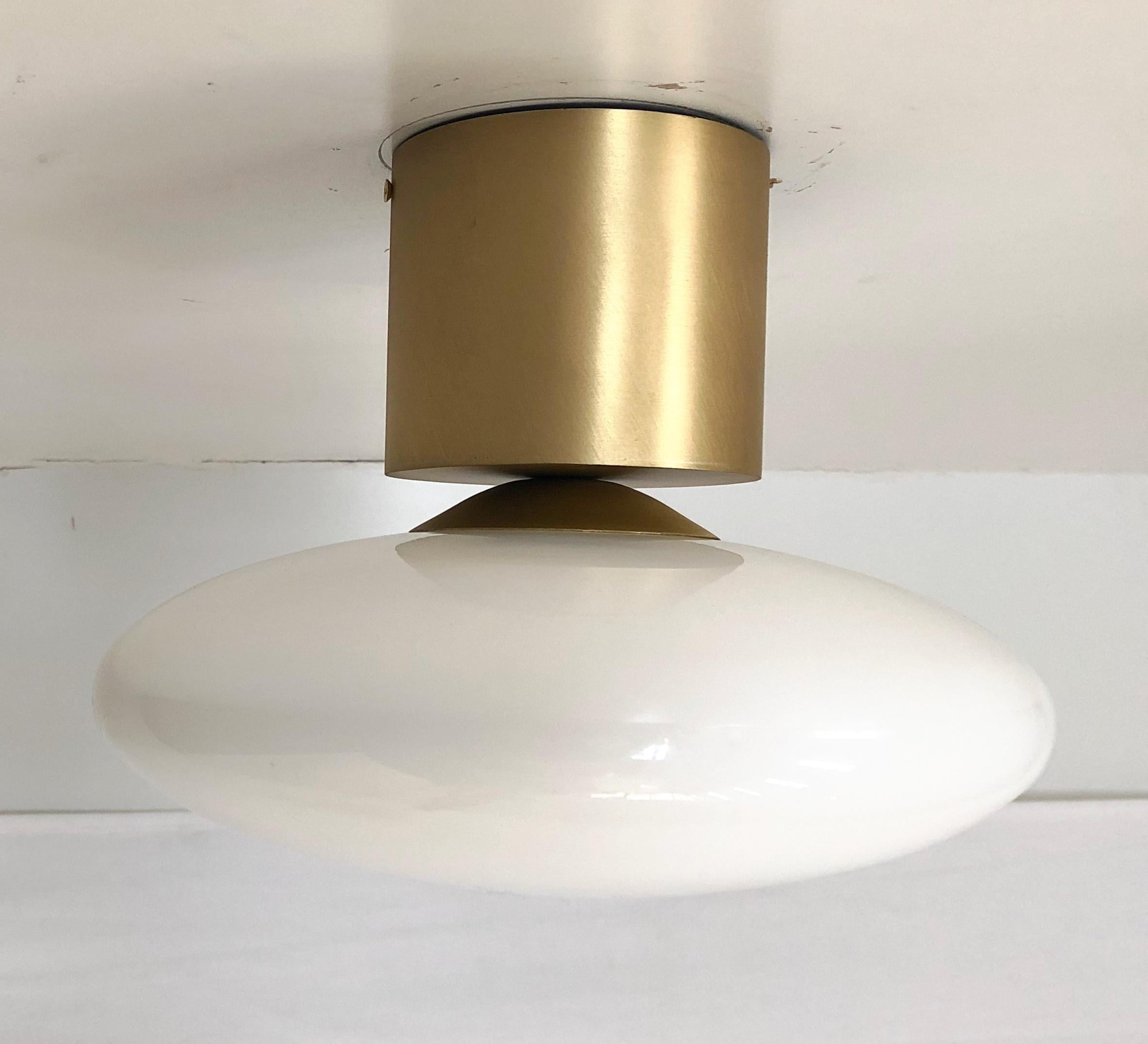 Italian flush mount with Murano glass shade and brass frame / Made in Italy
Designed by Fabio Ltd, inspired by Angelo Lelli and Arredoluce styles
1 light / E12 or E14 type / max 40W each
Diameter: 12 inches / Height: 9.5 inches
Order only / This