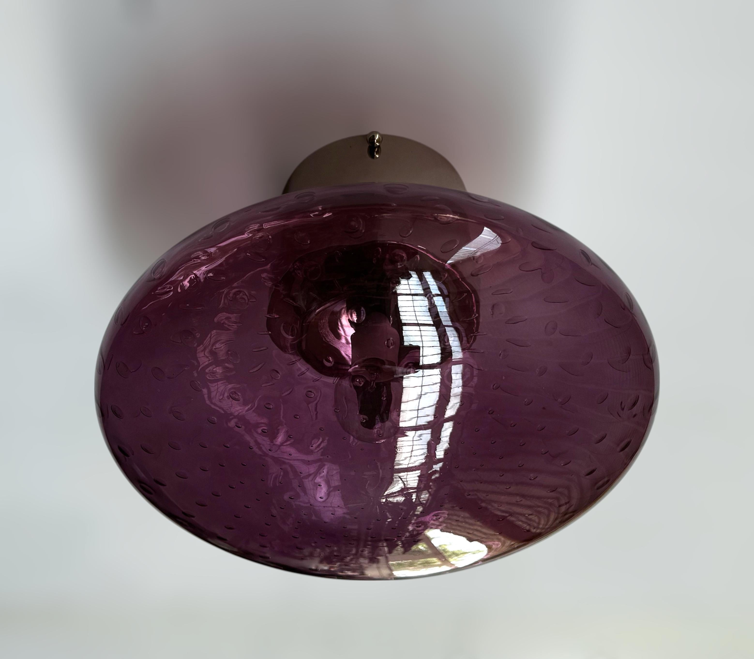 Italian flush mount with Murano glass shade and brass frame shown in polished nickel finish / Made in Italy
Designed by Fabio Ltd, inspired by Angelo Lelli and Arredoluce styles
1 light / E12 or E14 type / max 40W each
Diameter: 12 inches / Height: