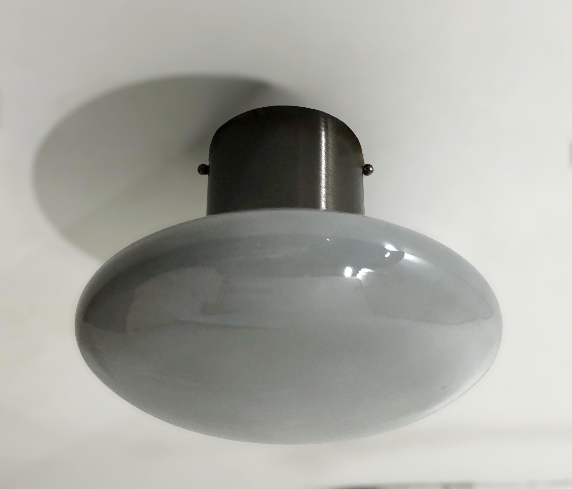 Italian flush mount with Murano glass shade and brass frame shown in satin black nickel finish / Made in Italy
Designed by Fabio Ltd, inspired by Angelo Lelli and Arredoluce styles
1 light / E12 or E14 type / max 40W each
Diameter: 12 inches /