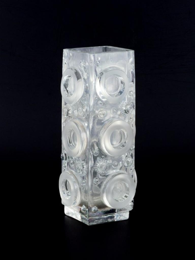 Uno Westerberg for Pukeberg, Sweden. 
Large art glass vase in clear art glass.
Decoration with relief circles.
1970s.
Perfect condition.
Dimensions: D 10.0 cm x H 28.0 cm.