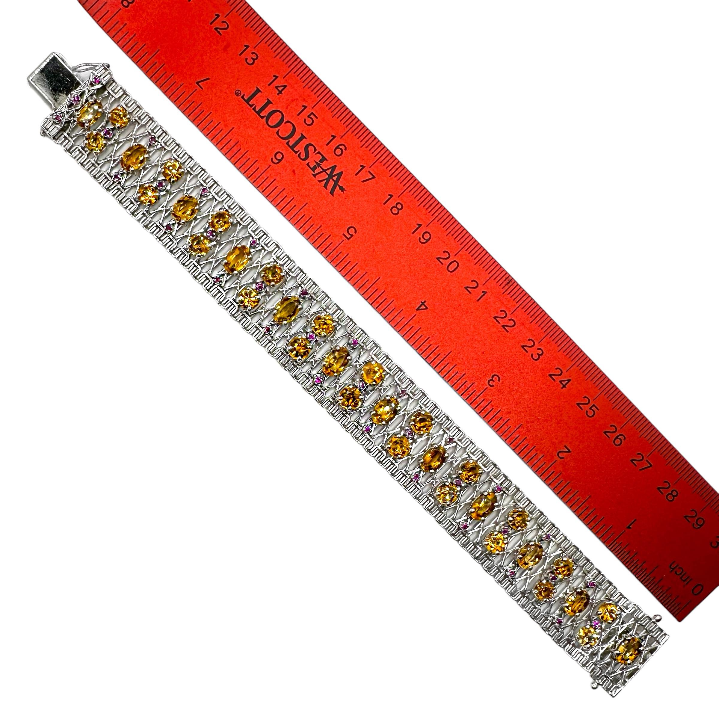 Unoaerre Pulsera de Oro Blanco de 18 K con Topacio Imperial y Rubíes Corte oval en venta