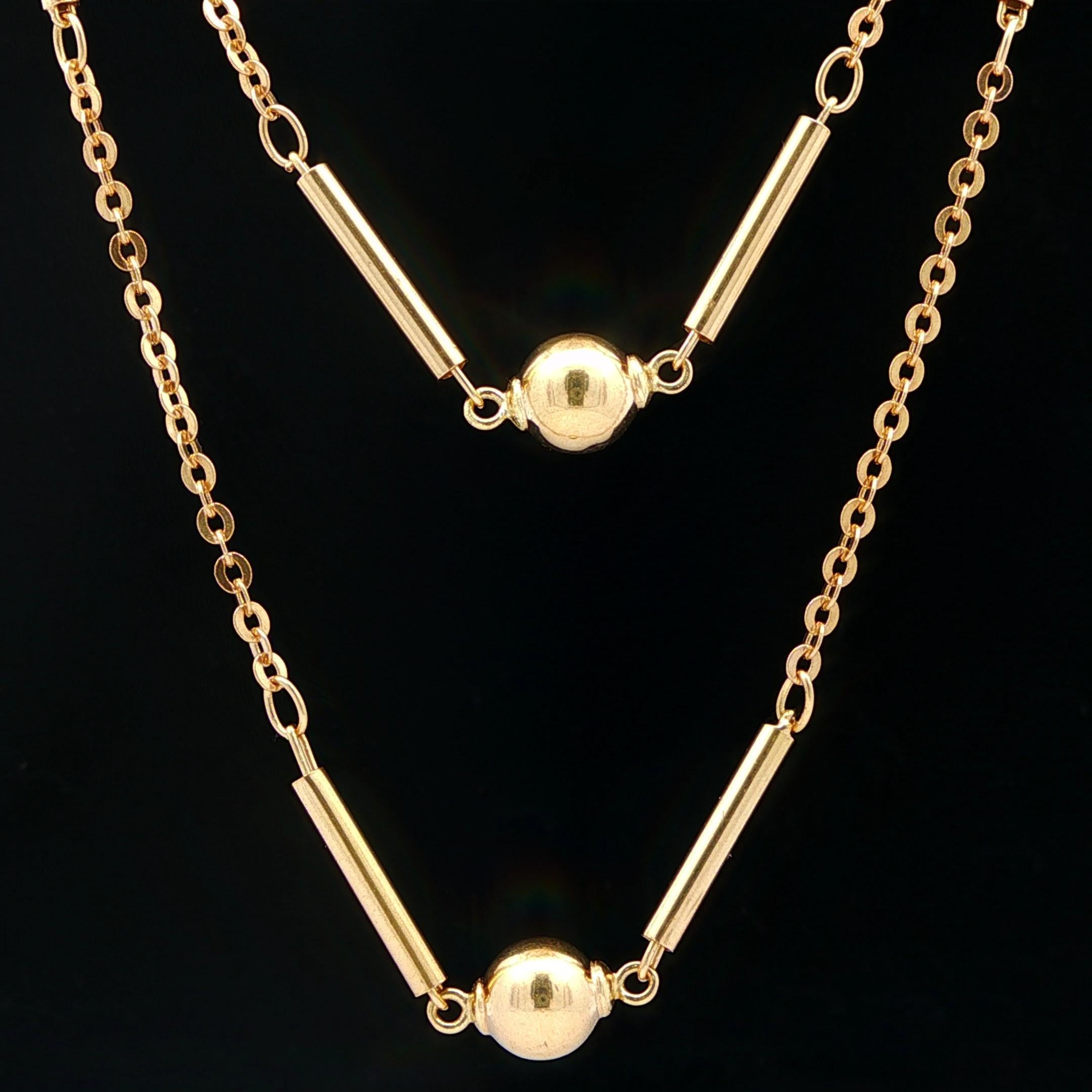 MATERIAL: Massives 18k Gelbgold
Gewicht: 24,27 Gramm
Kette Typ: 32 Zoll - Bar & Bead Ball Station auf Kabel Link - Federringverschluss
Dicke und Breite: 7,9 mm (0,31) (ca.) (an den Wülsten) - 2,5 mm (0,09