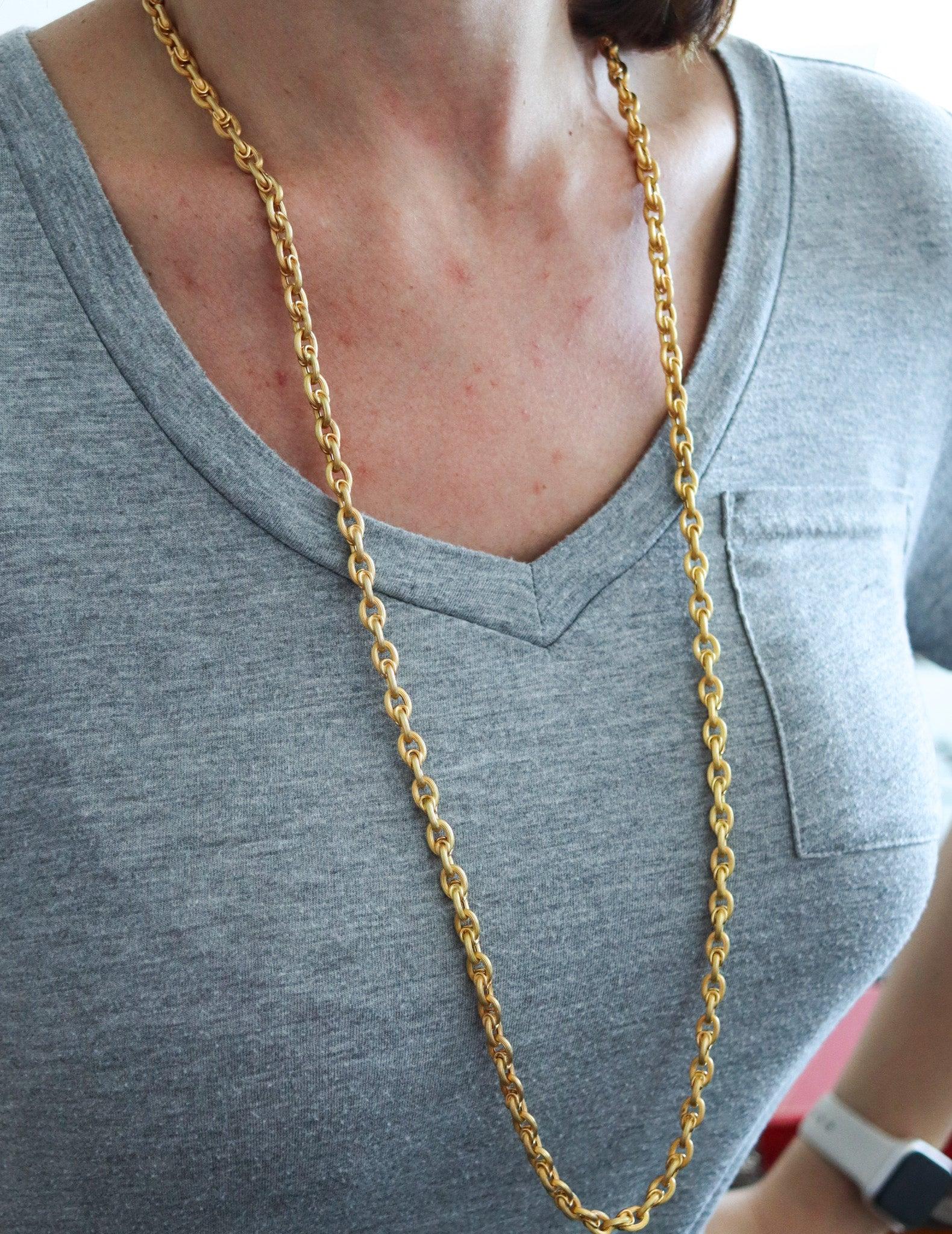 A vintage long chain designed by Uno A Erre.

This is a fantastic long chain created in the city of Arezzo in Italy during the post-war and mid-century periods by the company of Uno A Erre, back in the 1950. The chain has an unusual length of